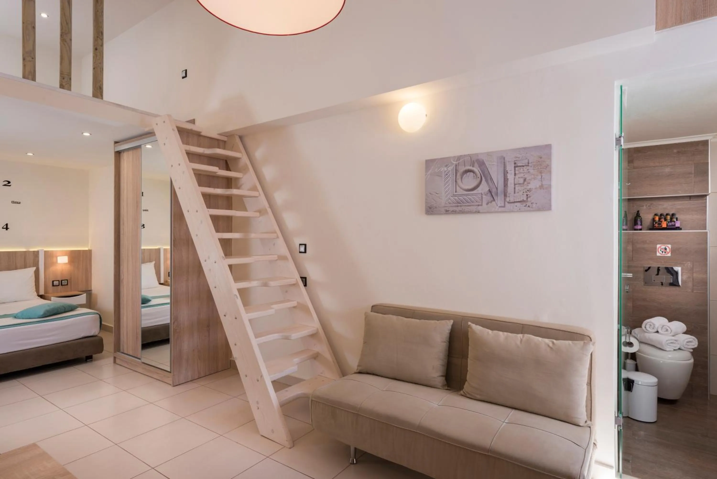 Seating area, Bed in Sea & City Apartments