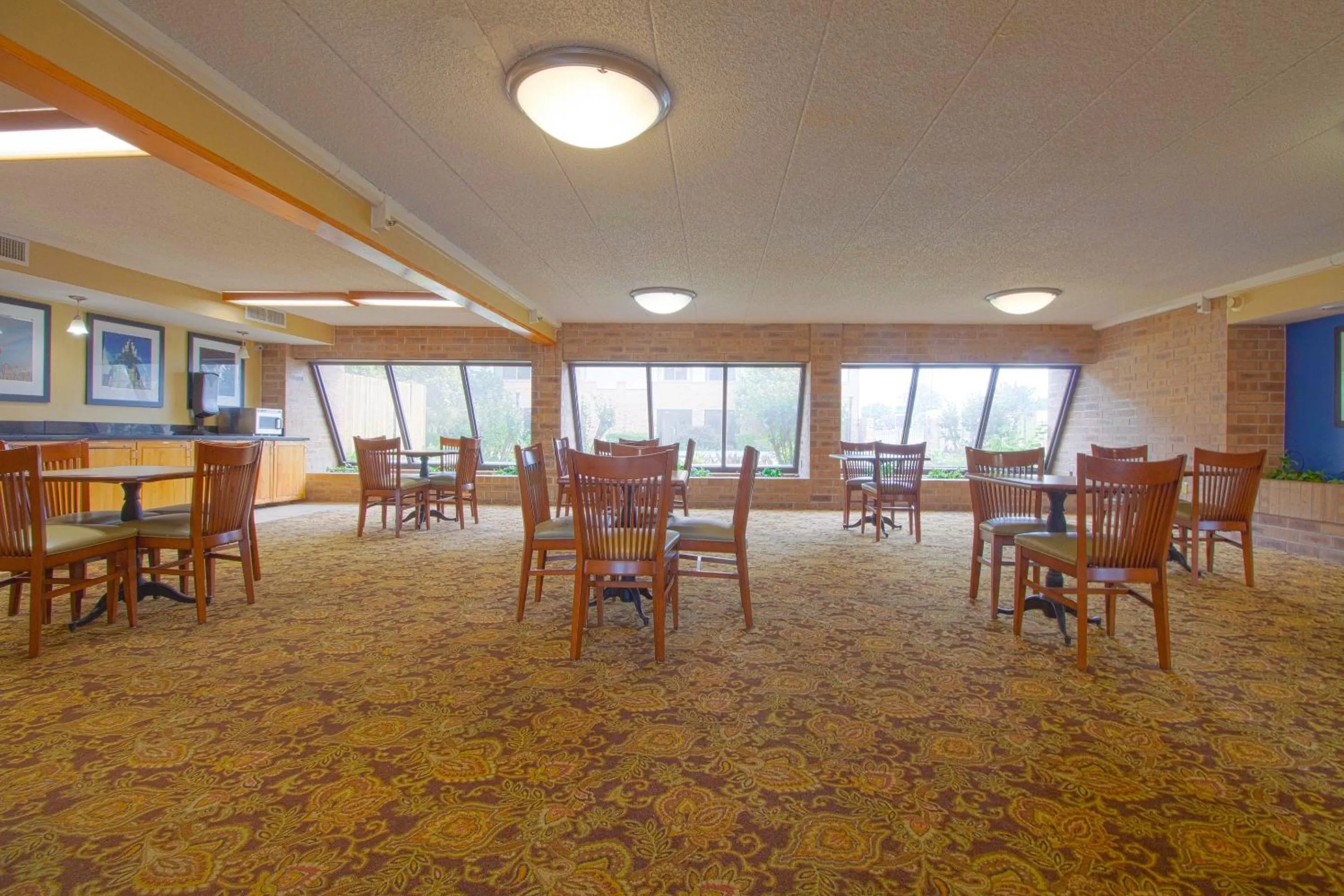 Dining area in Tulsa Square Hotel Central, I-44 By OYO