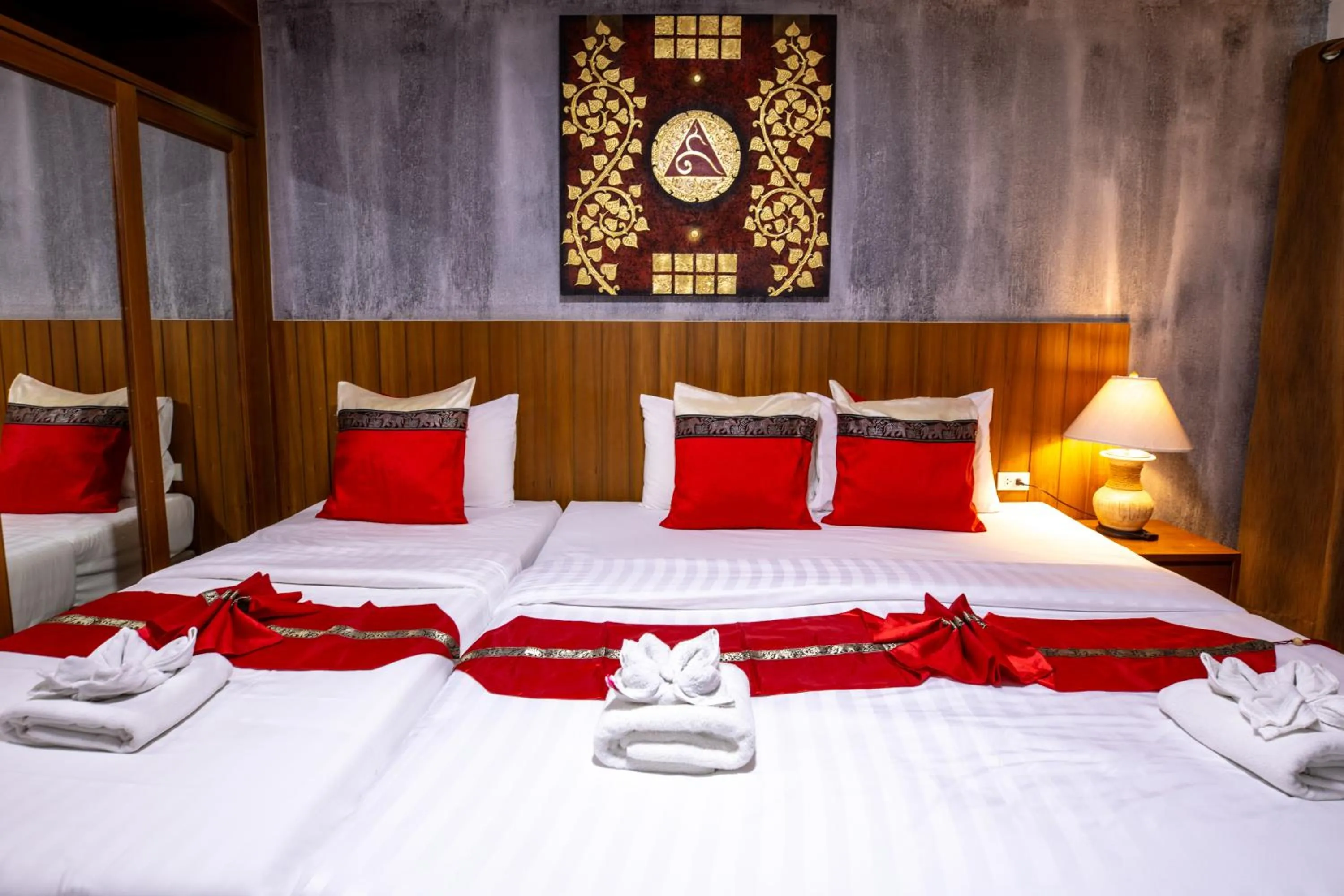 Bed in Huen Jao Ban Hotel