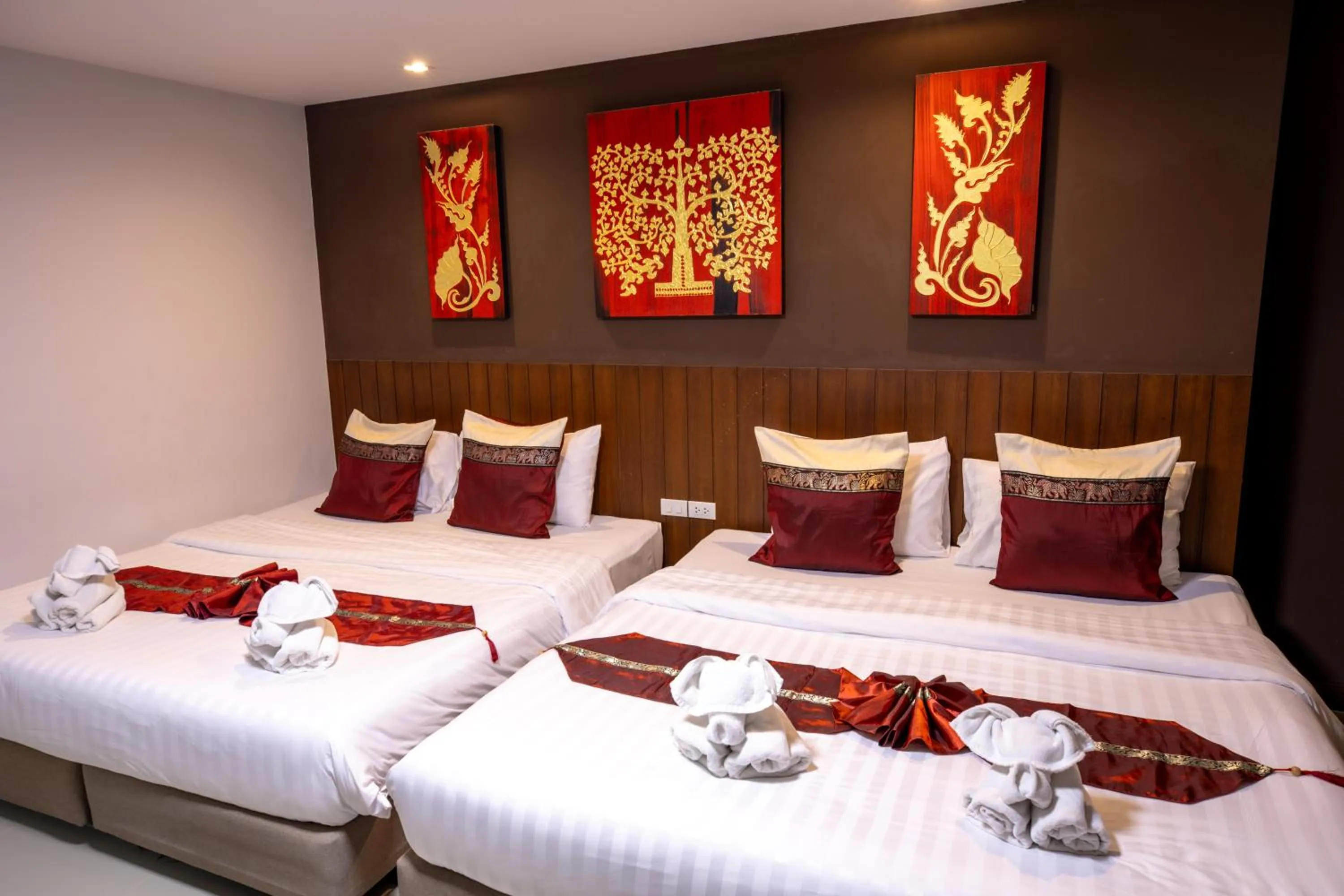 Bed in Huen Jao Ban Hotel