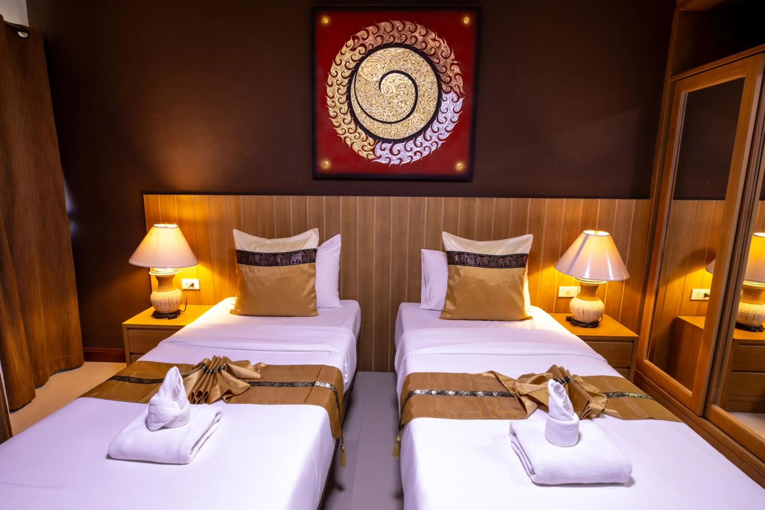 Bed in Huen Jao Ban Hotel