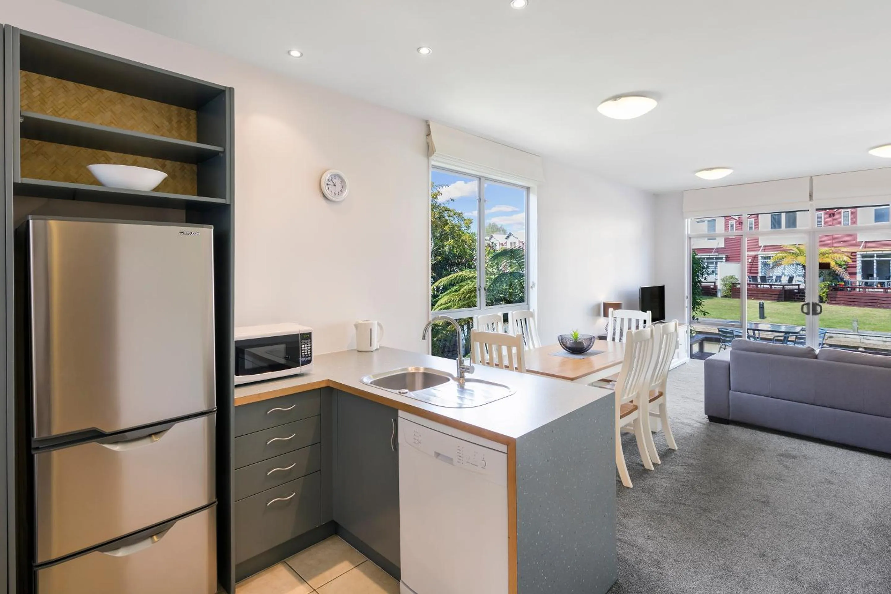 Kitchen or kitchenette in Ramada Resort By Wyndham Rotorua Marama