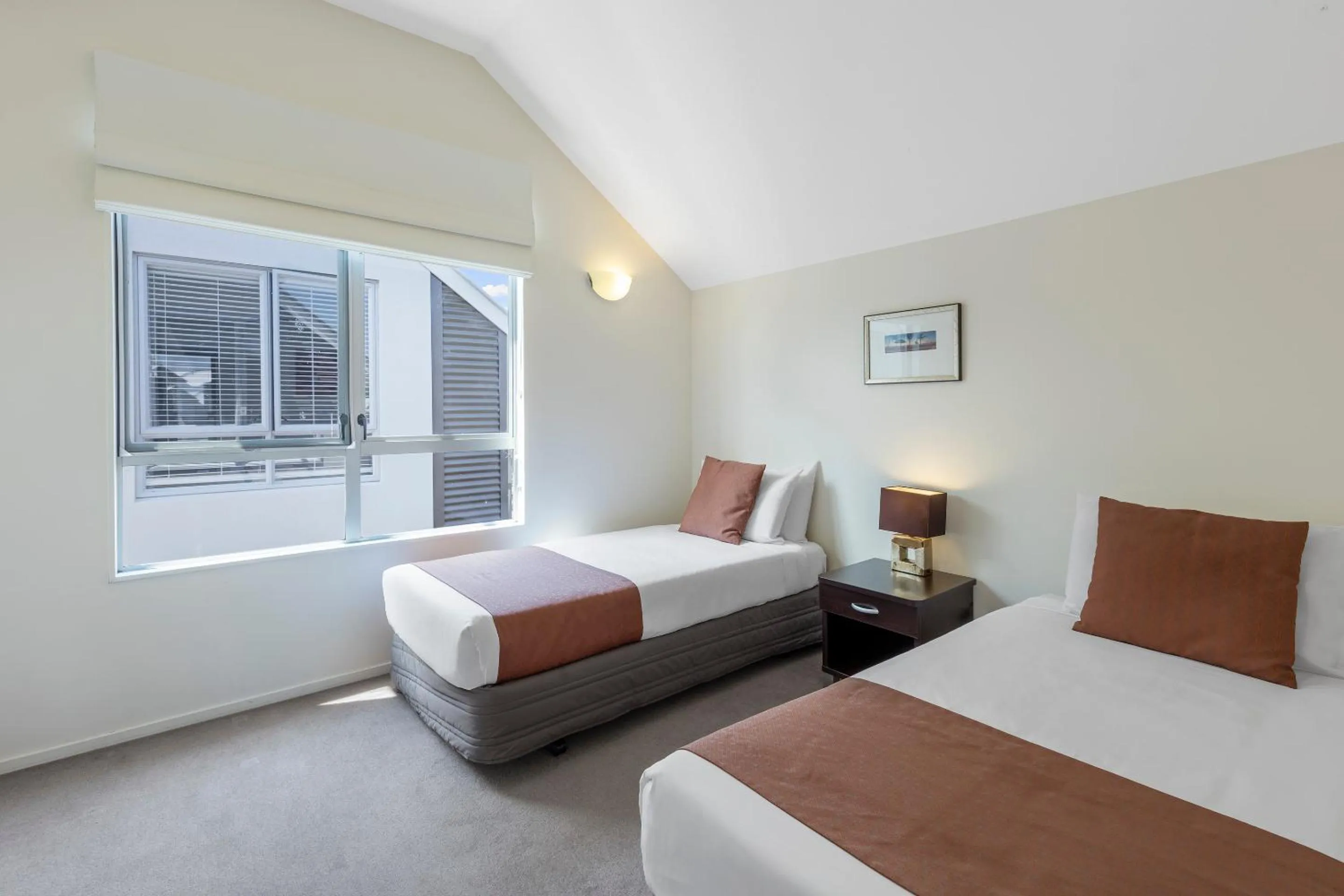 Bedroom, Bed in Ramada Resort By Wyndham Rotorua Marama