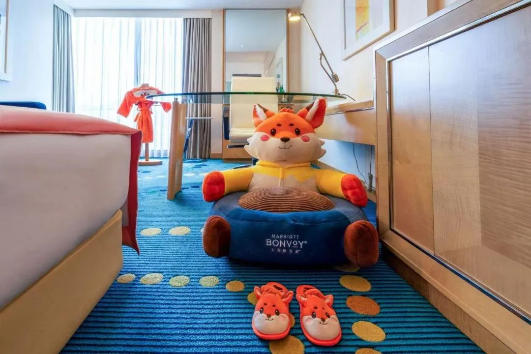 Bed in Renaissance Shanghai Yu Garden Hotel on the Bund