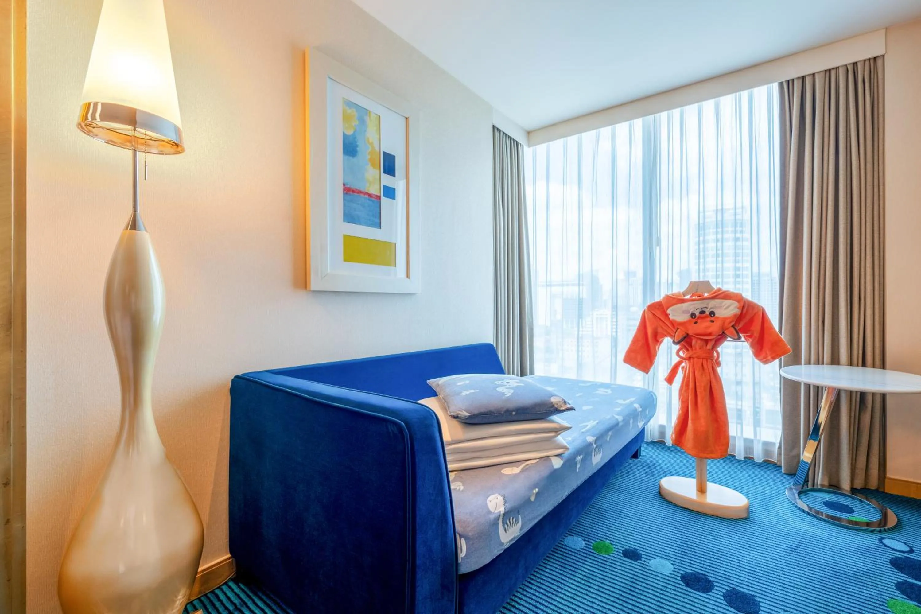 Bed in Renaissance Shanghai Yu Garden Hotel on the Bund by Nanjing Road