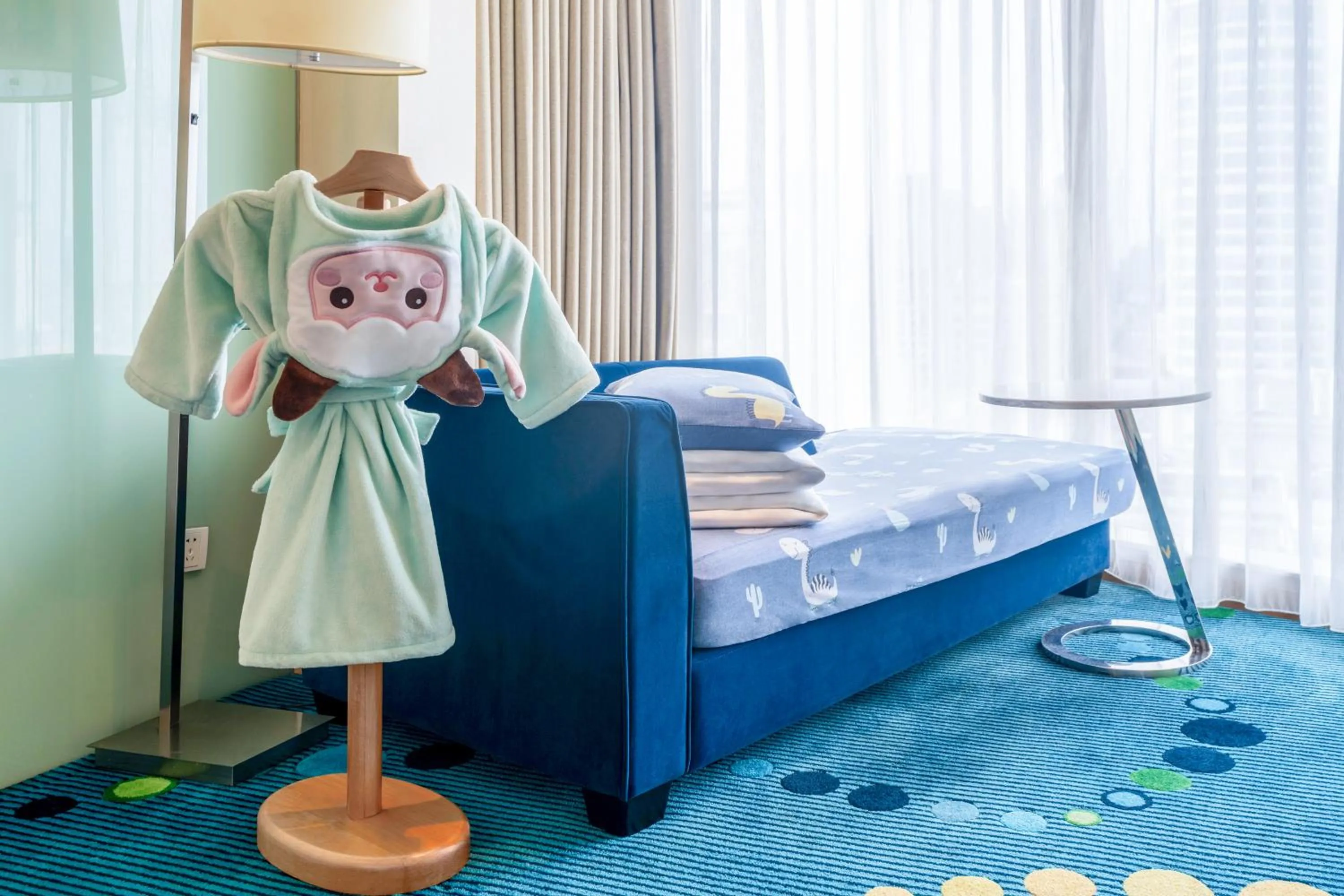 Bed in Renaissance Shanghai Yu Garden Hotel on the Bund by Nanjing Road