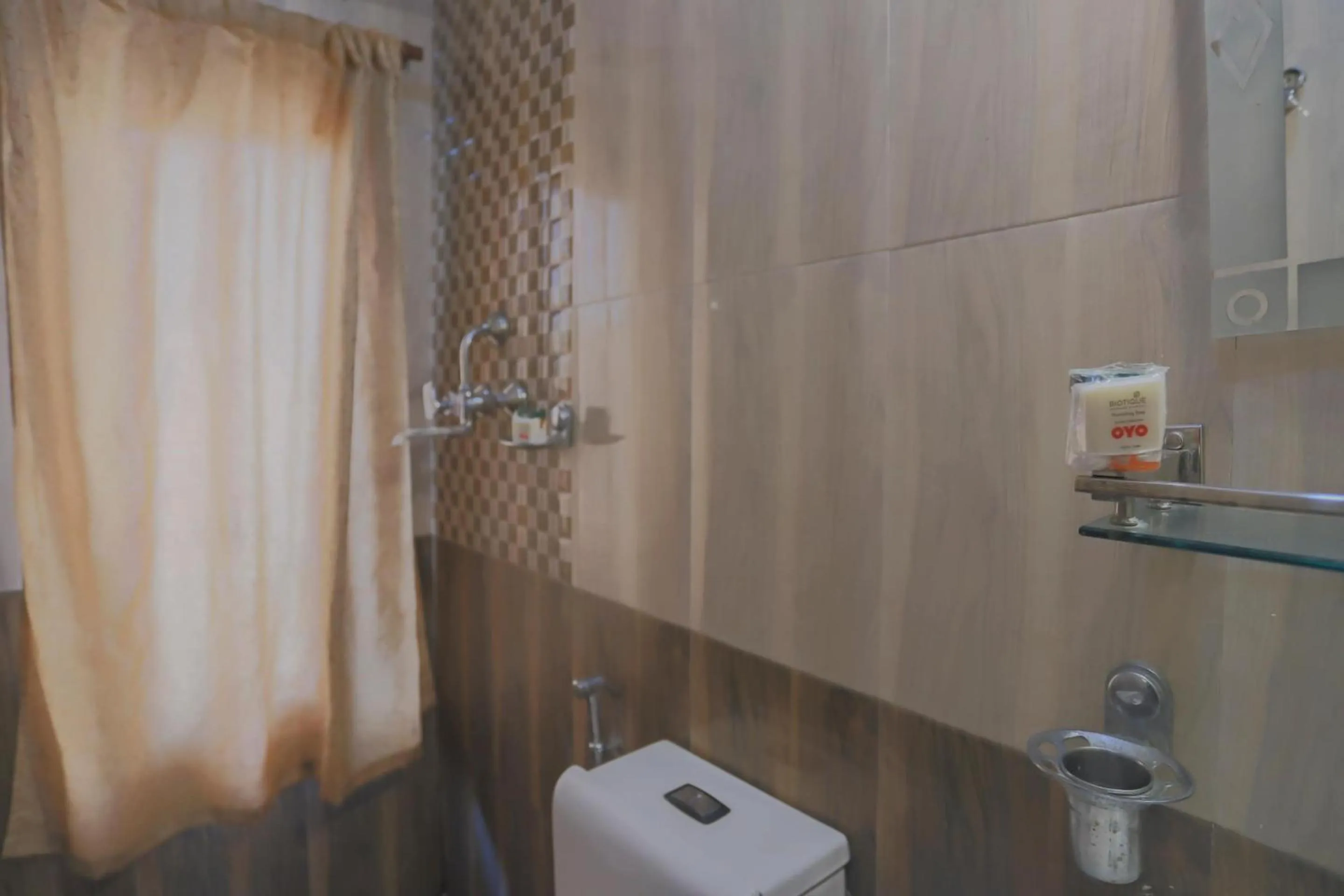 Bathroom in OYO 789 Hotel Shivam Plaza