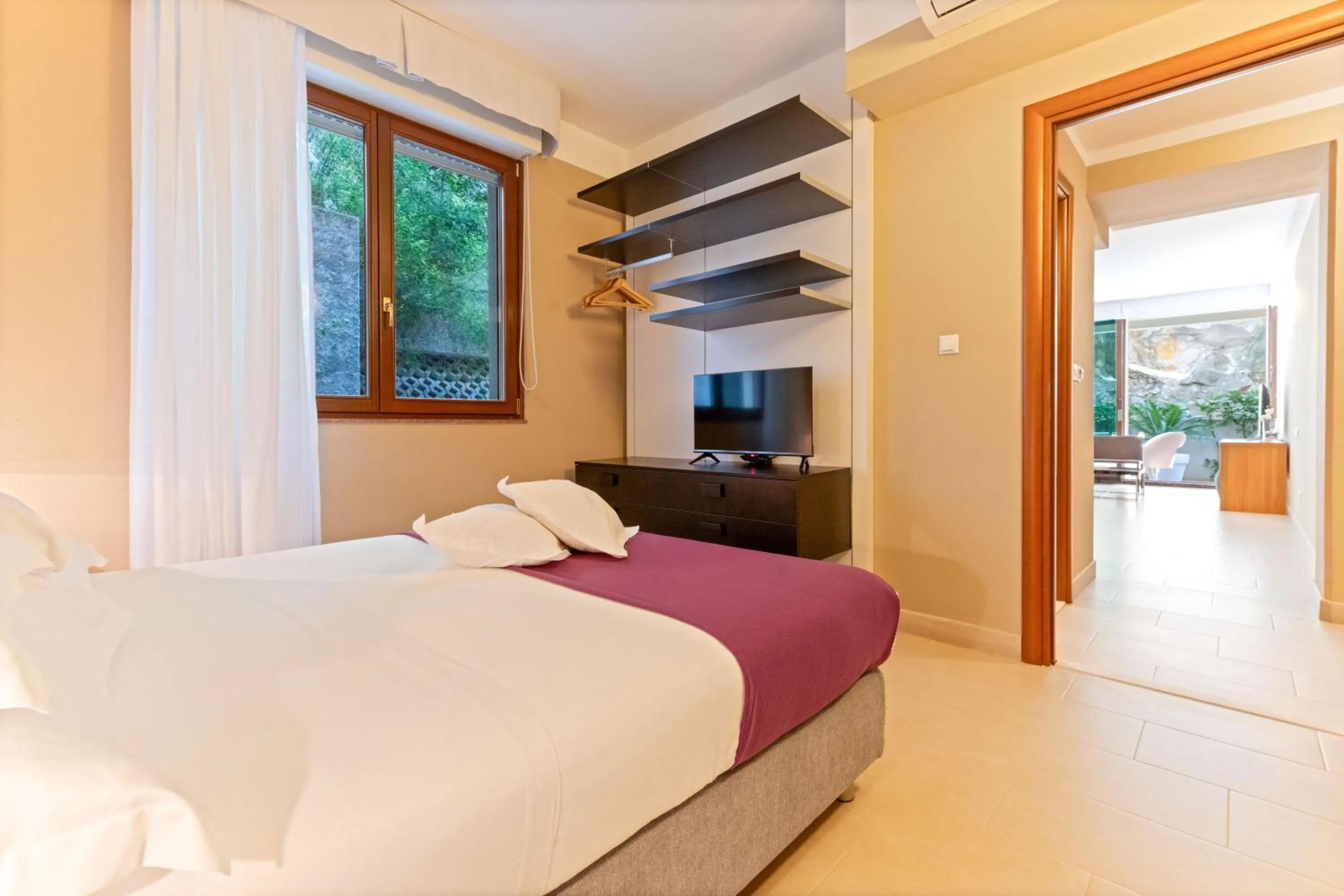 Bed in The Residence Aparthotel