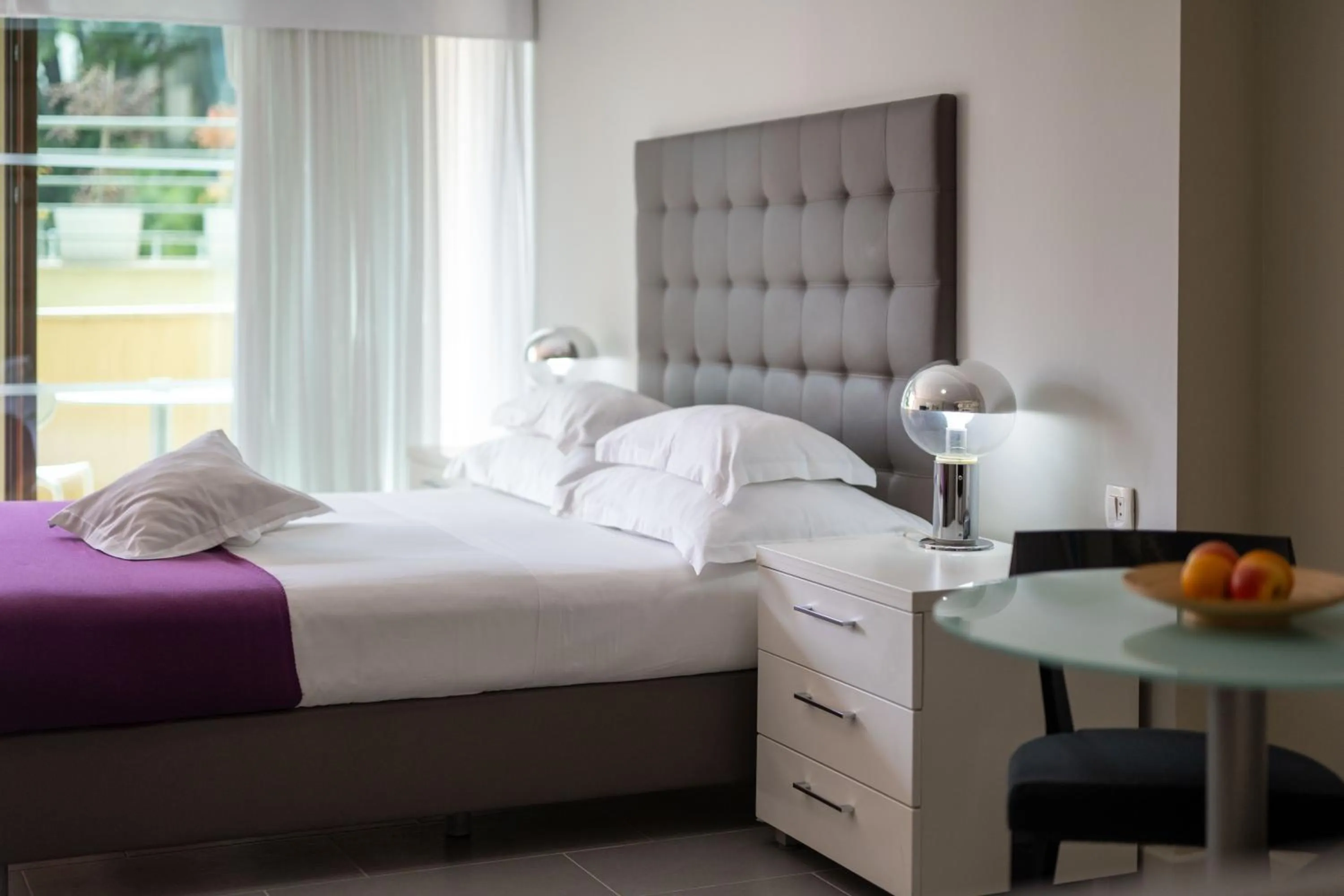 Bed in The Residence Aparthotel