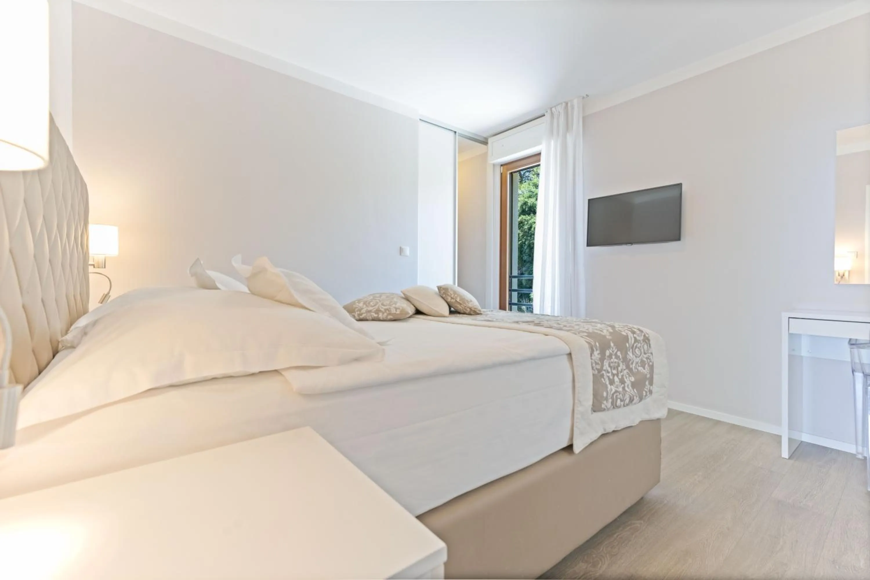 Bed in The Residence Aparthotel