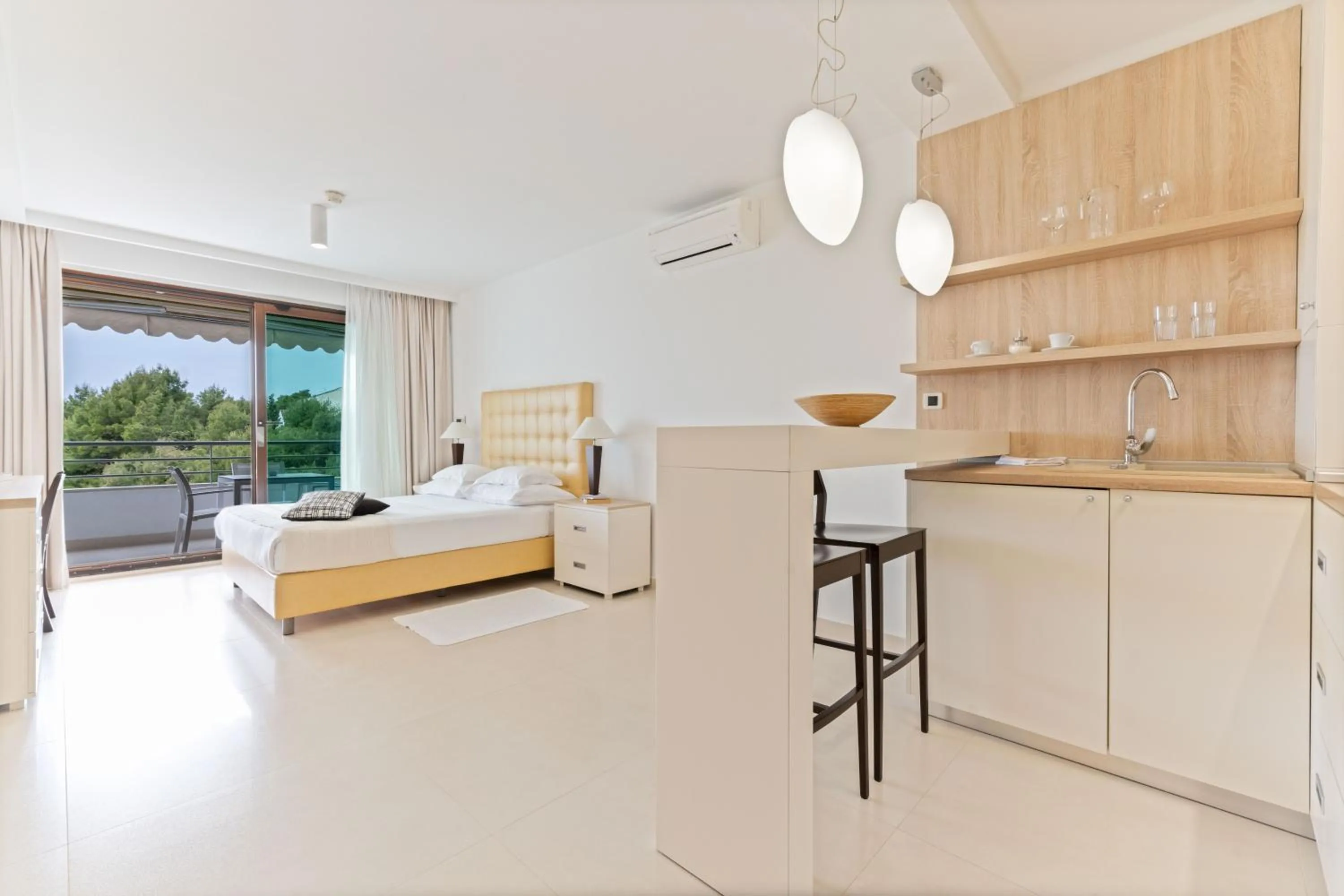 Bed in The Residence Aparthotel