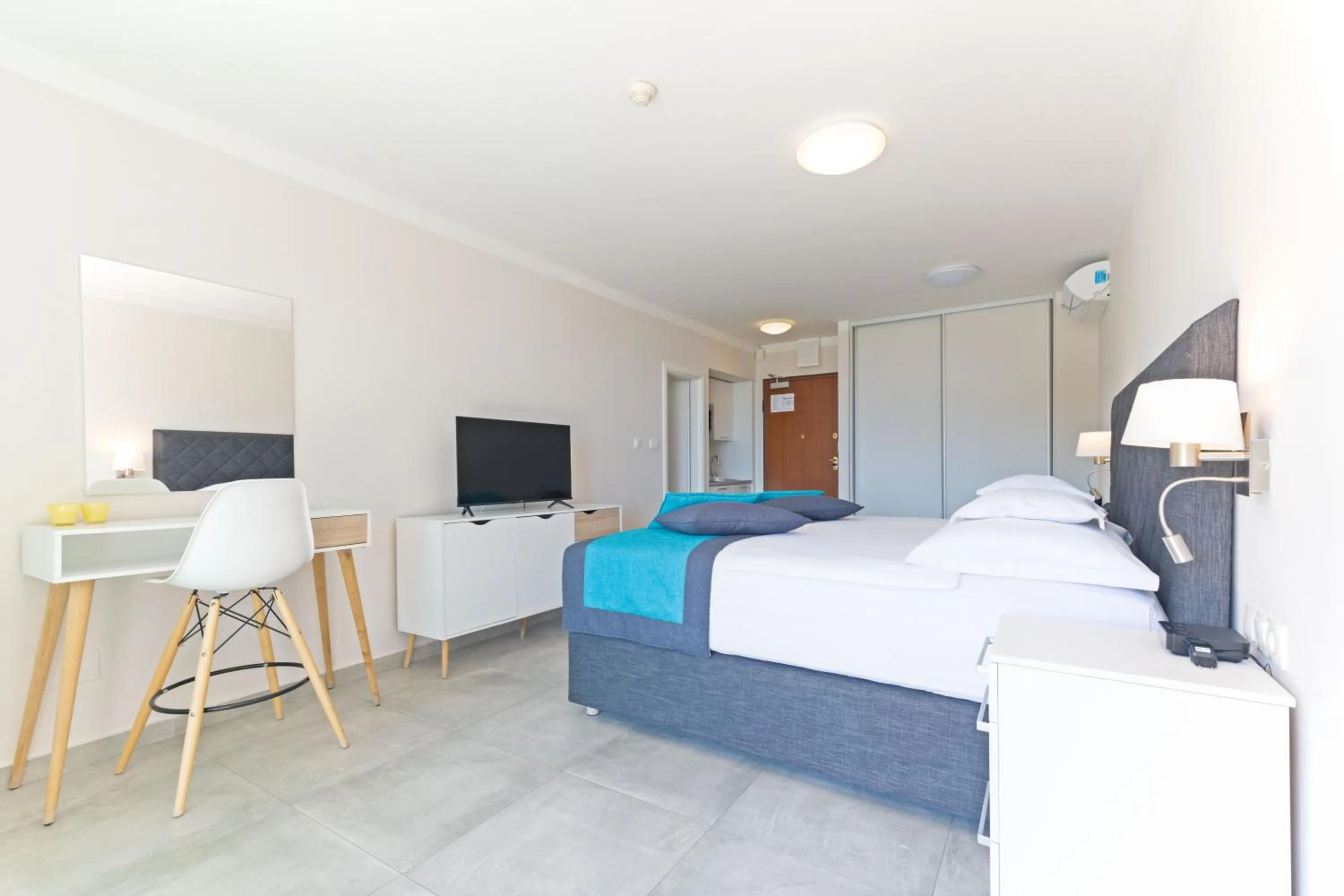 Bed in The Residence Aparthotel