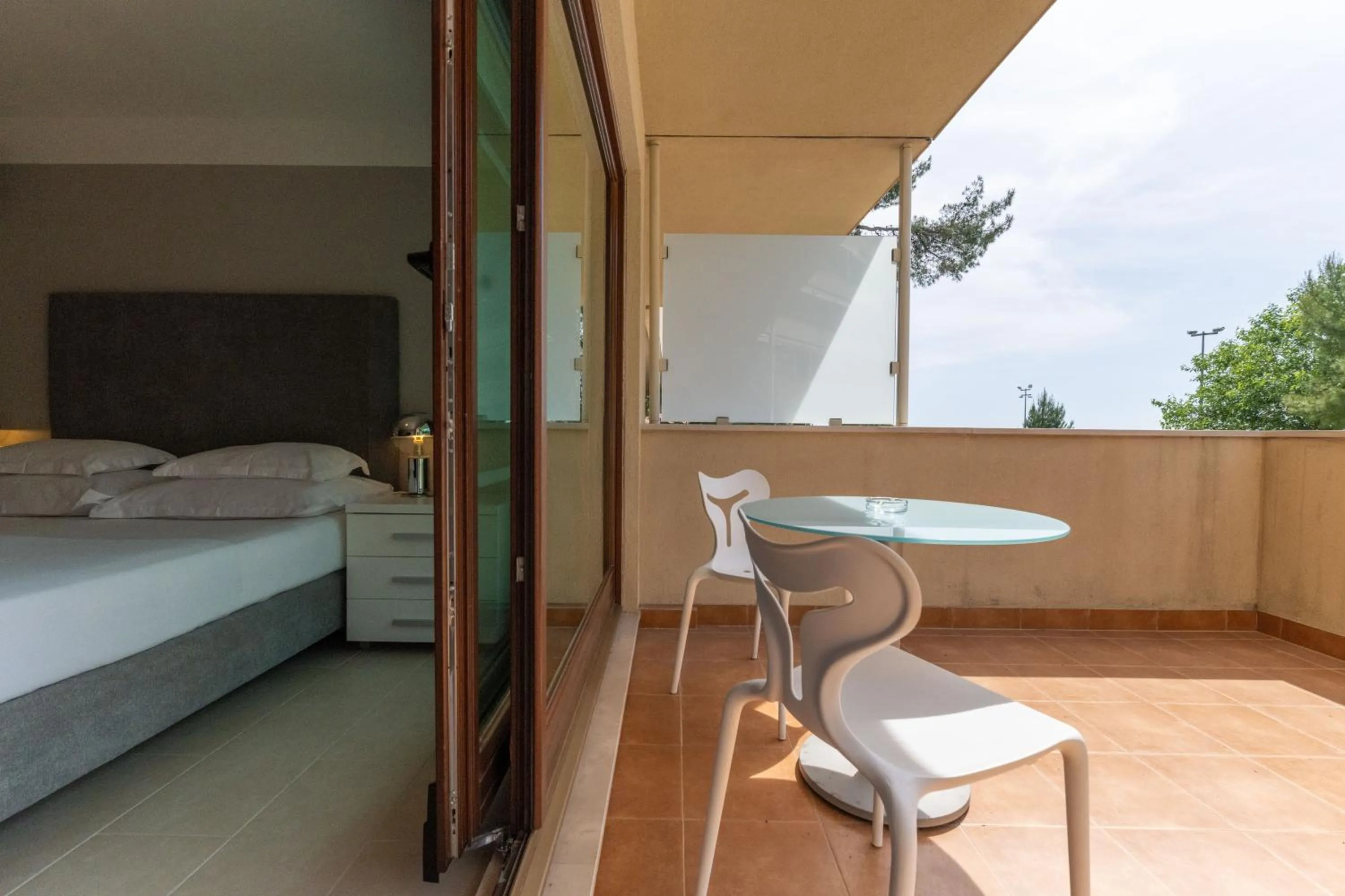 Bed in The Residence Aparthotel