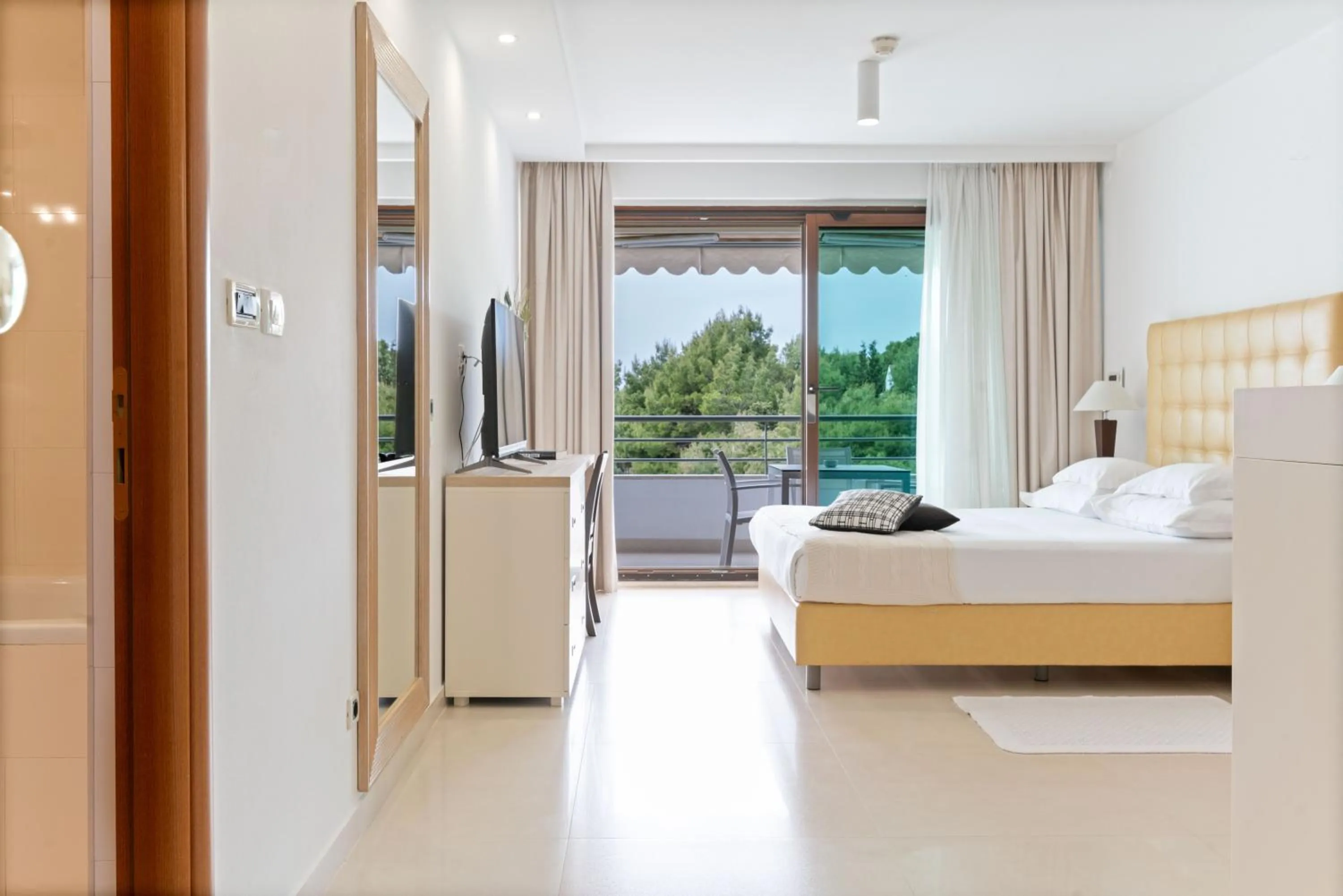 Bed in The Residence Aparthotel