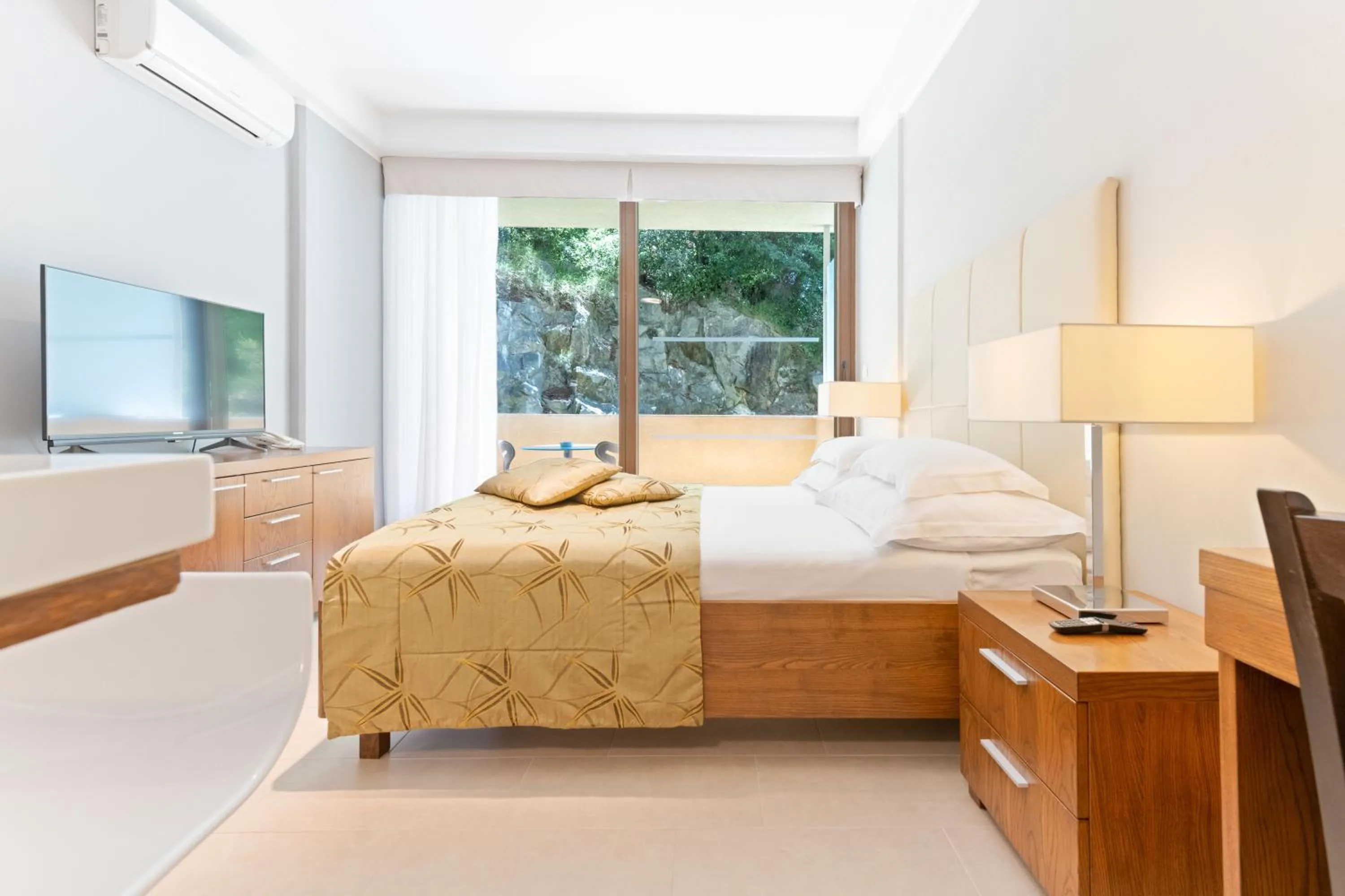 Bed in The Residence Aparthotel