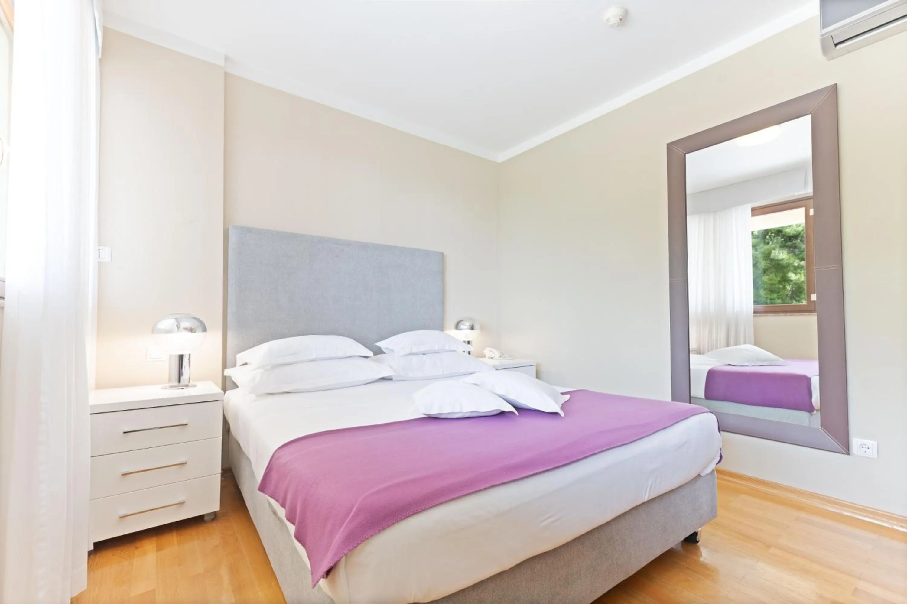 Bed in The Residence Aparthotel