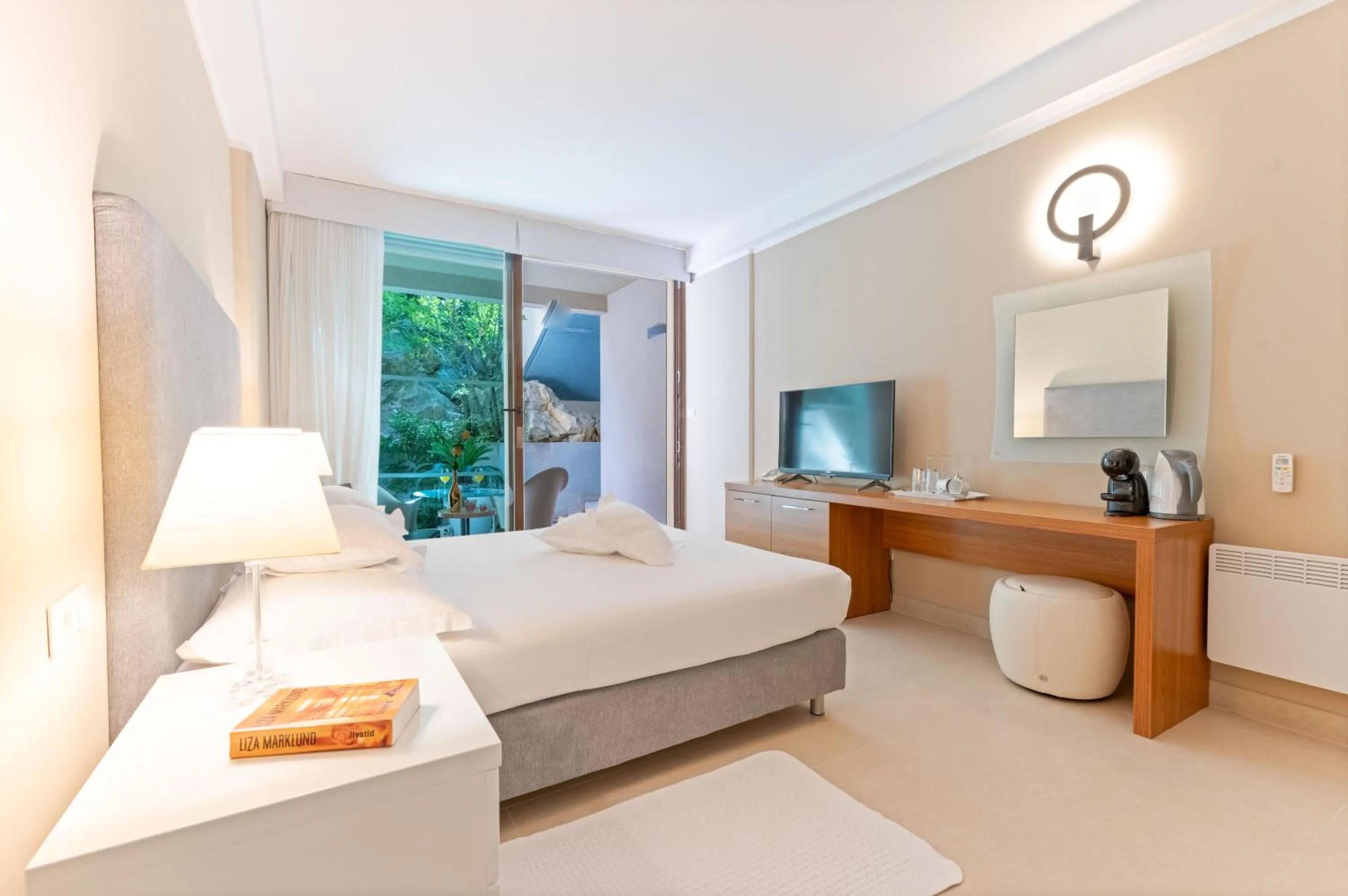 Bed in The Residence Aparthotel