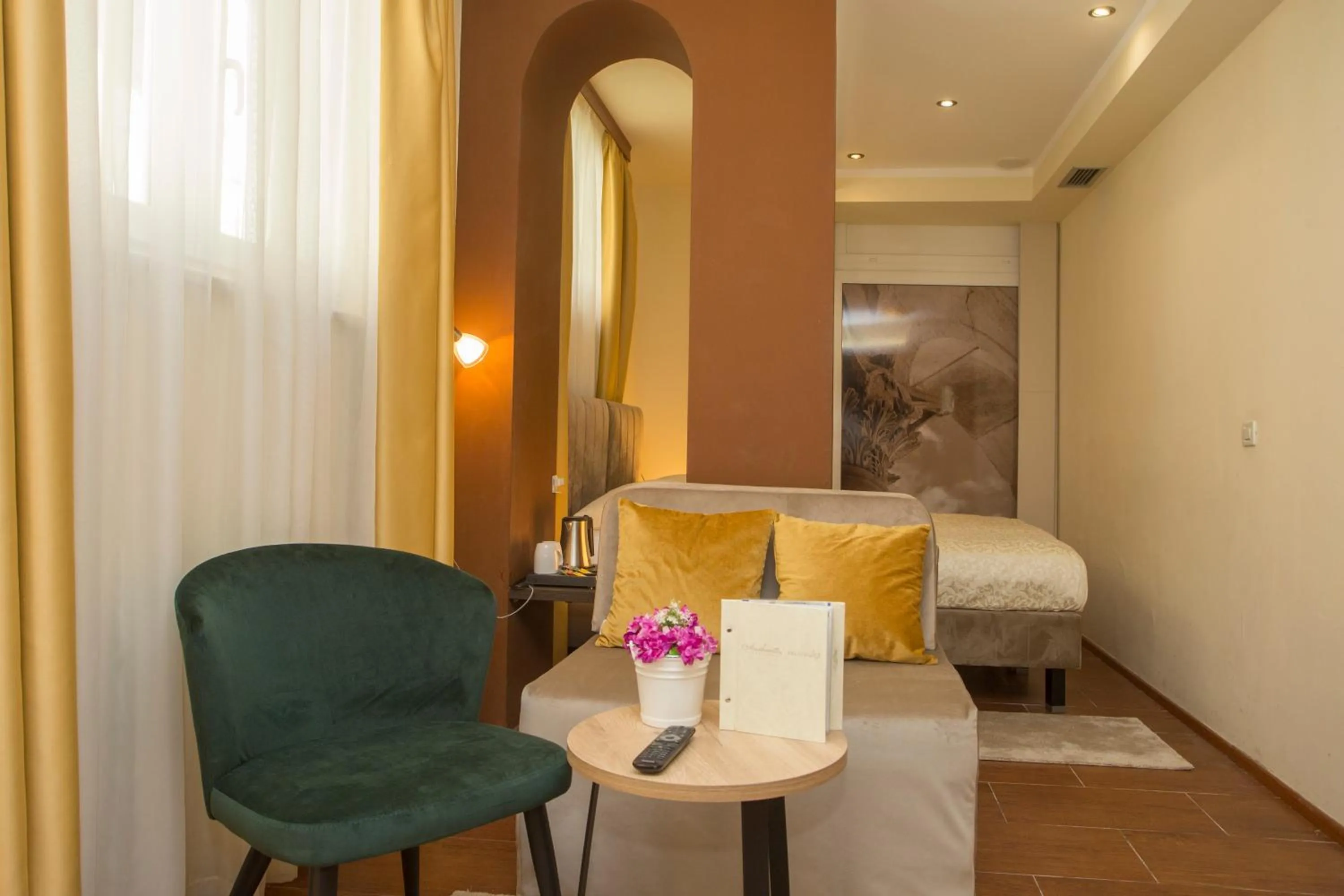 Seating area, Bed in Authentic Luxury Rooms