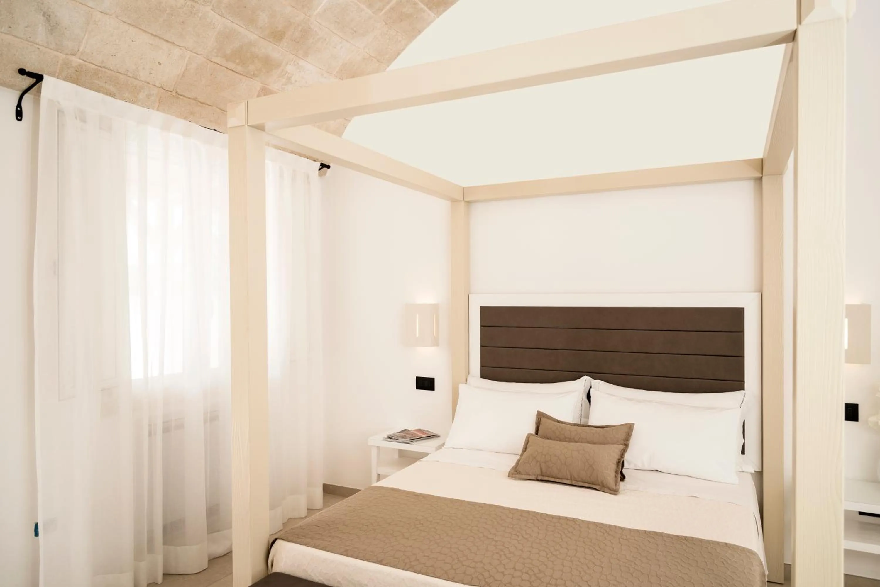 Bed in Masseria Muntibianchi AgriResort Restaurant & SPA