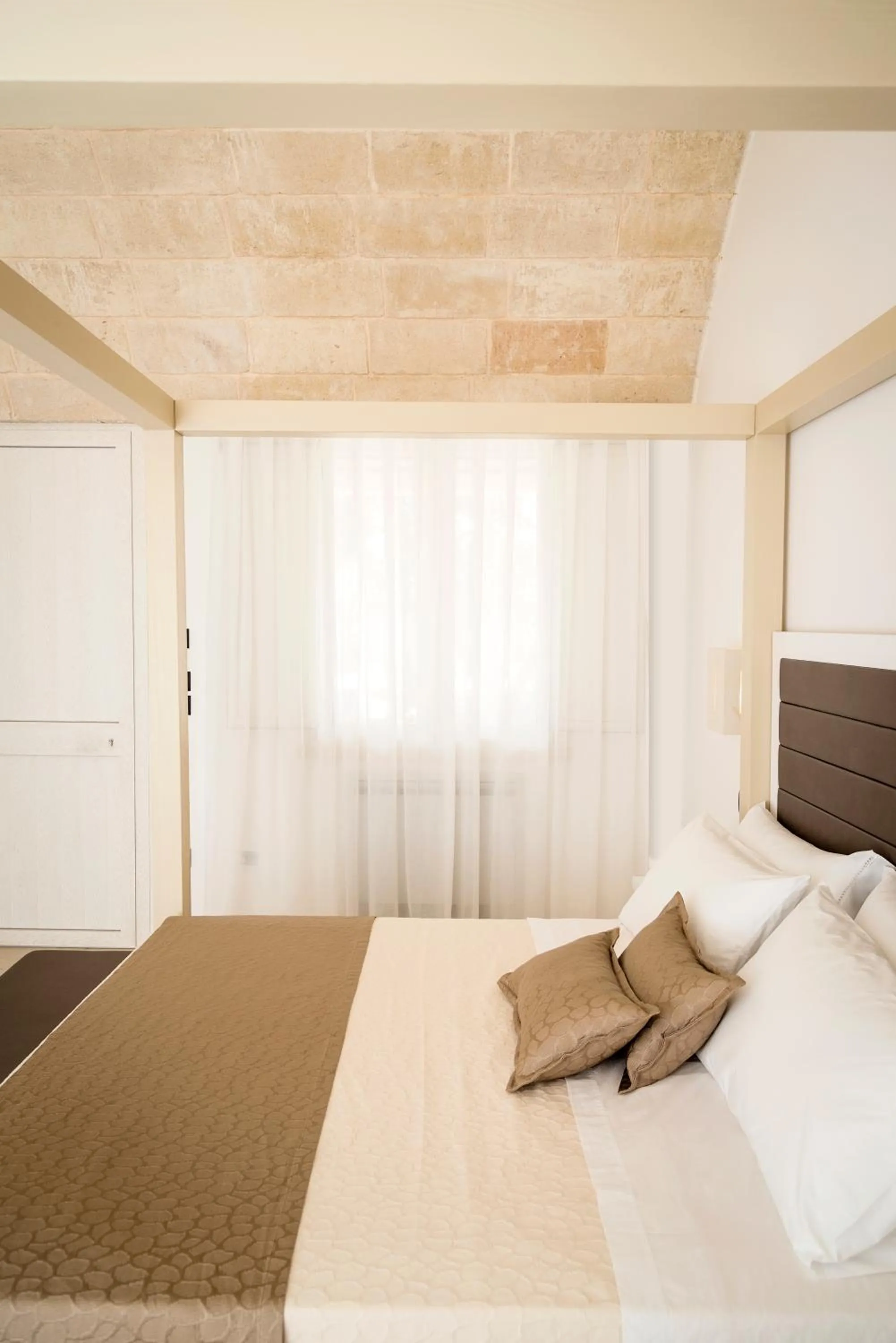 Bed in Masseria Muntibianchi AgriResort Restaurant & SPA