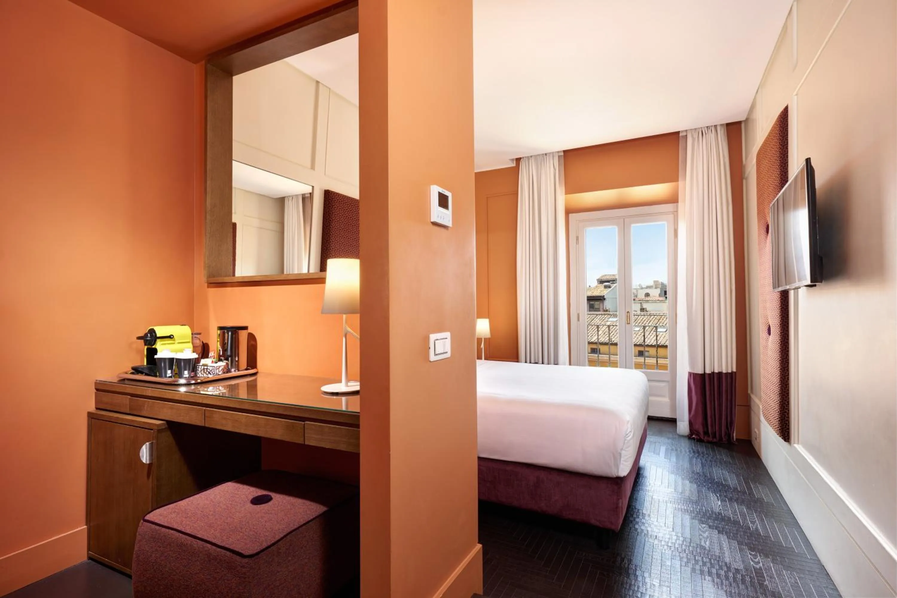 Bed in Mascagni Luxury Rooms & Suites