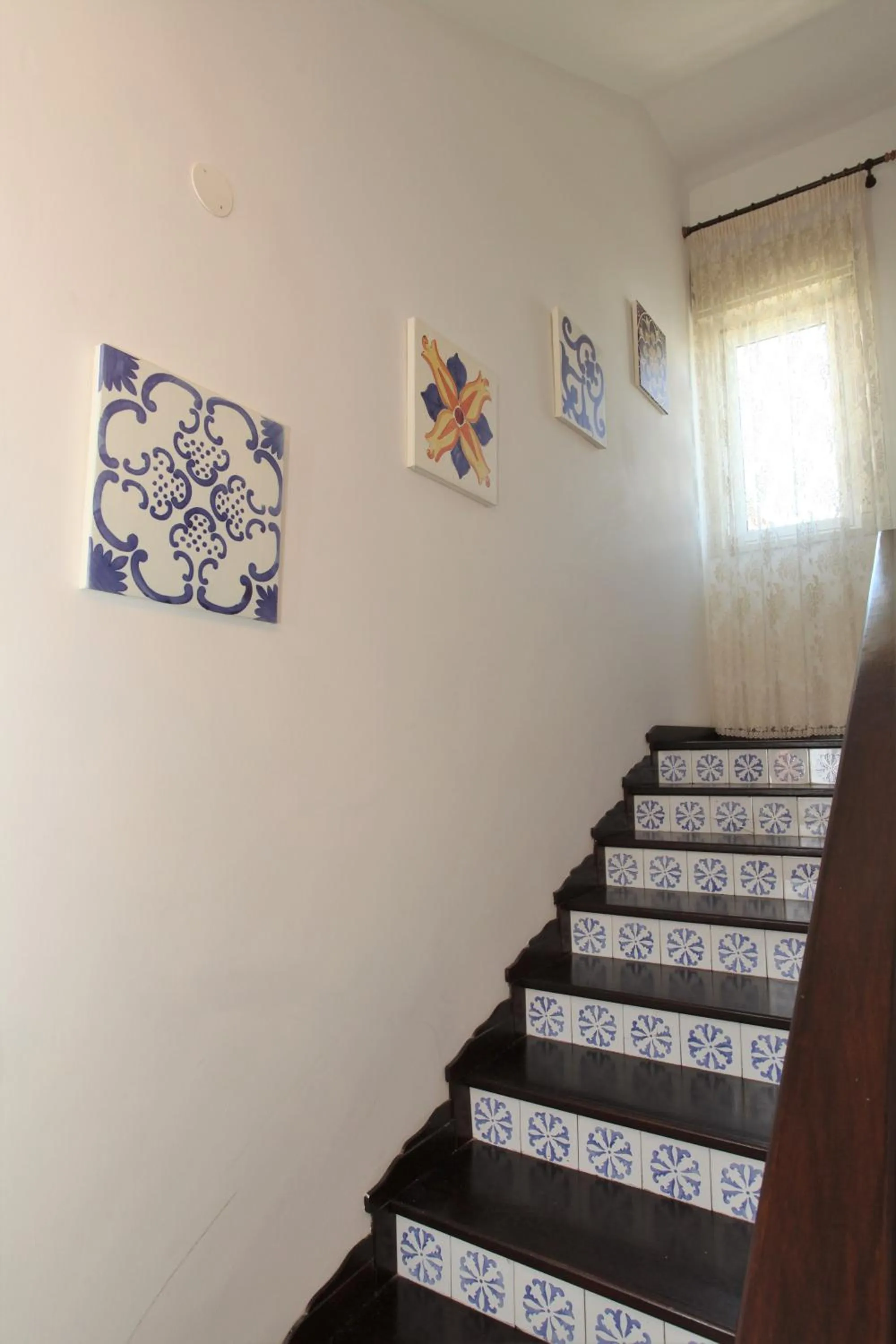 Communal lounge/ TV room in B&B Villa Maiolica