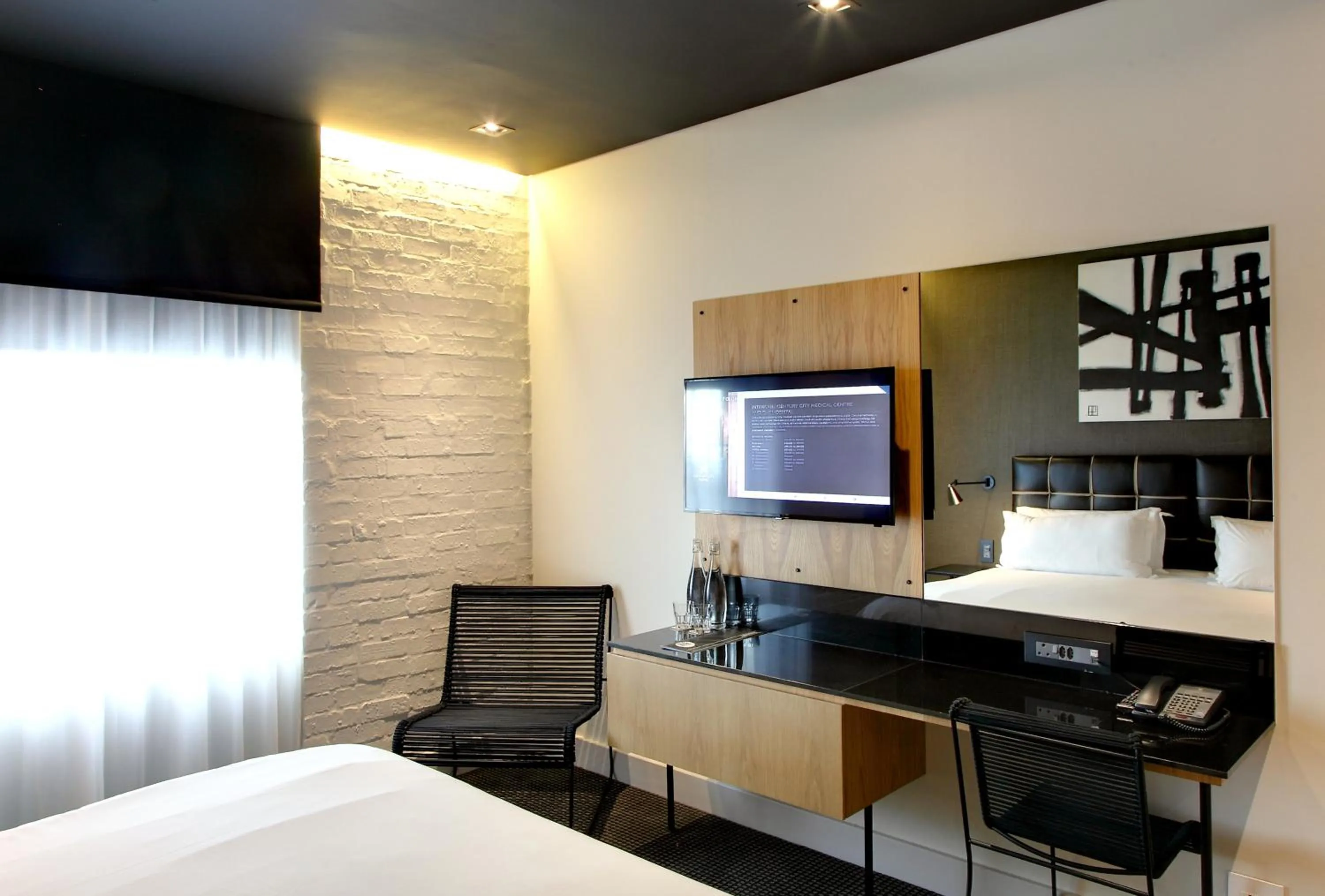 Seating area, Bed in Century City Hotel Urban Square