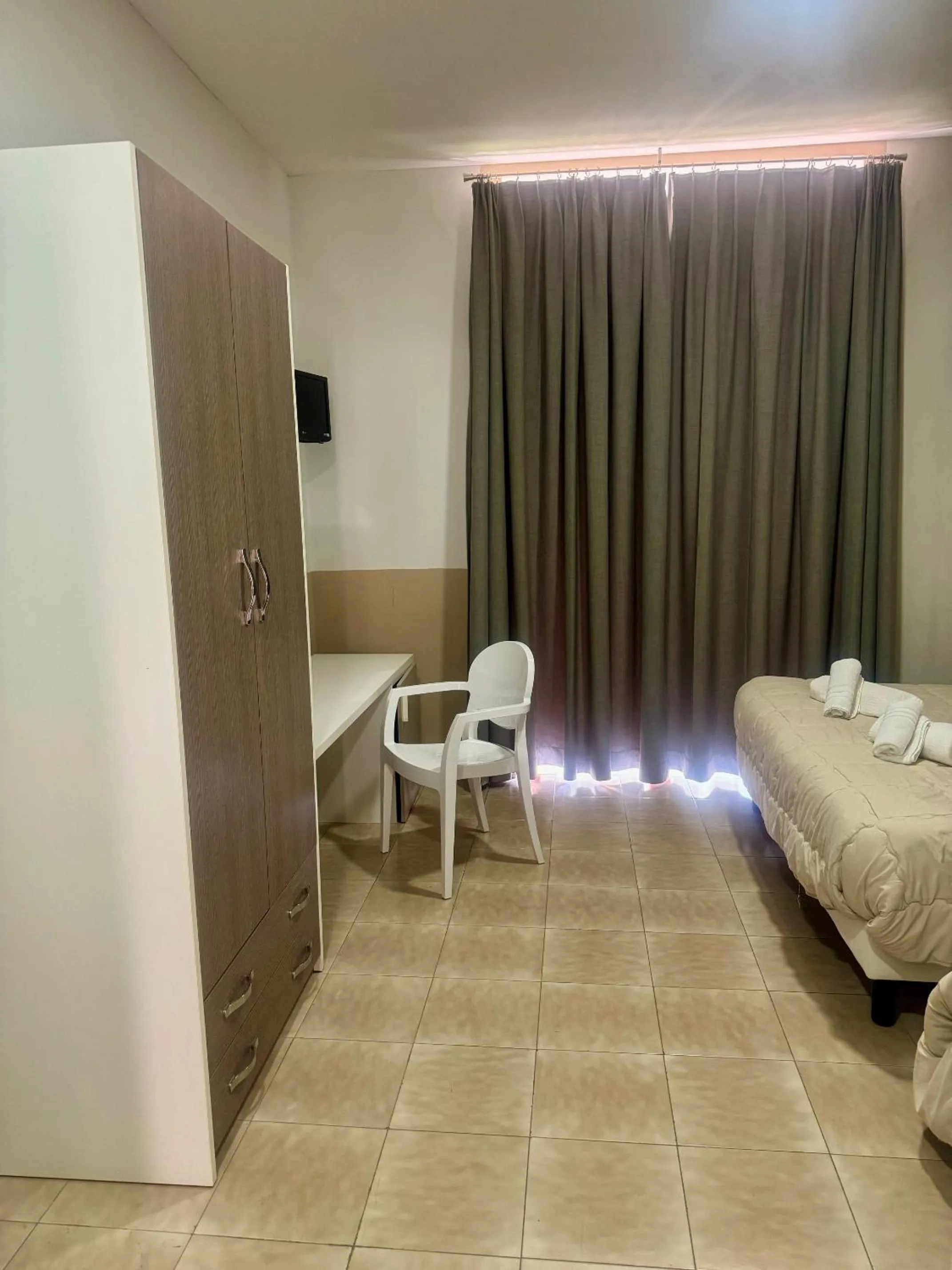 Bed, Seating Area in Hotel Santuario