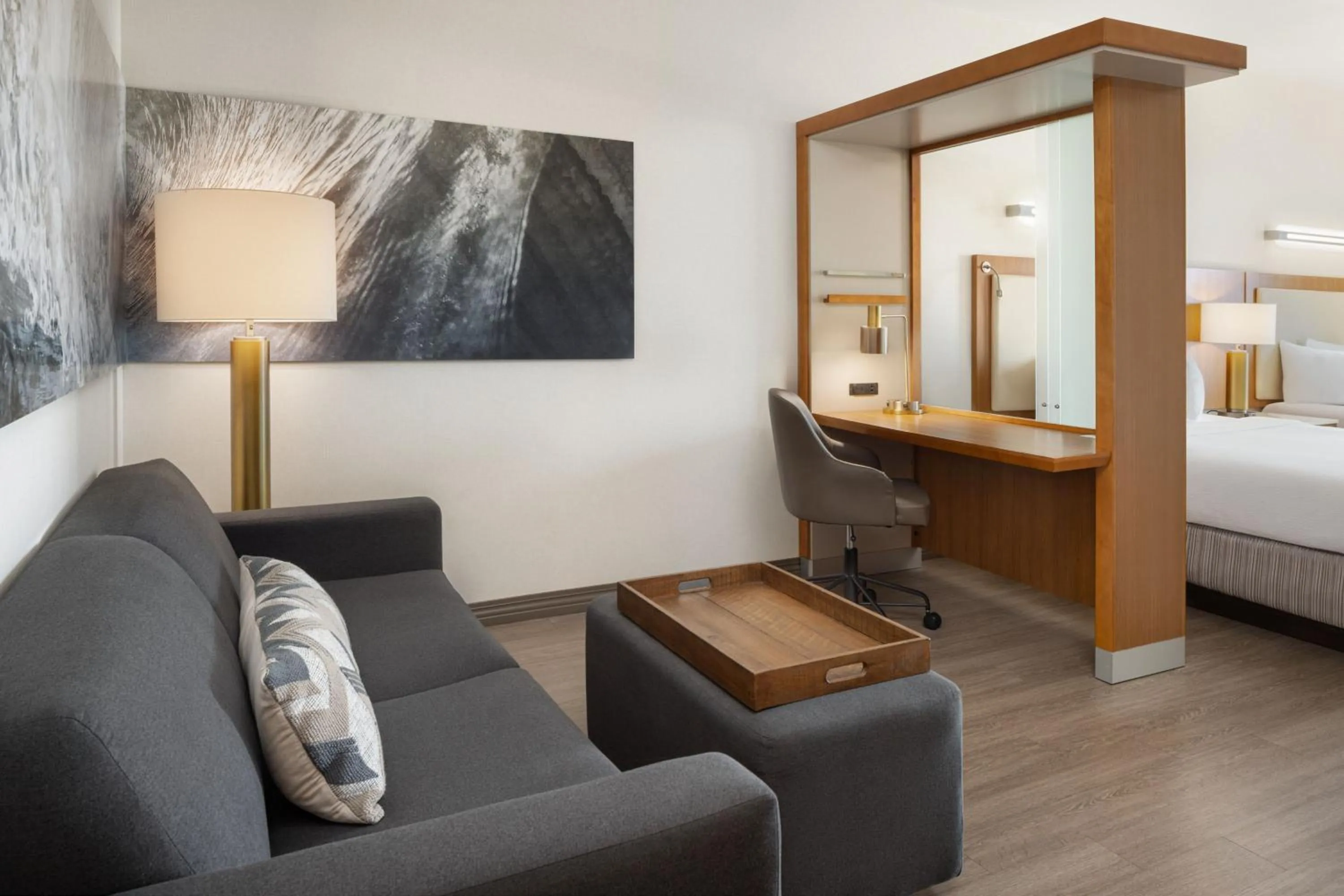 Living room, Bed in SpringHill Suites Orange Beach at The Wharf