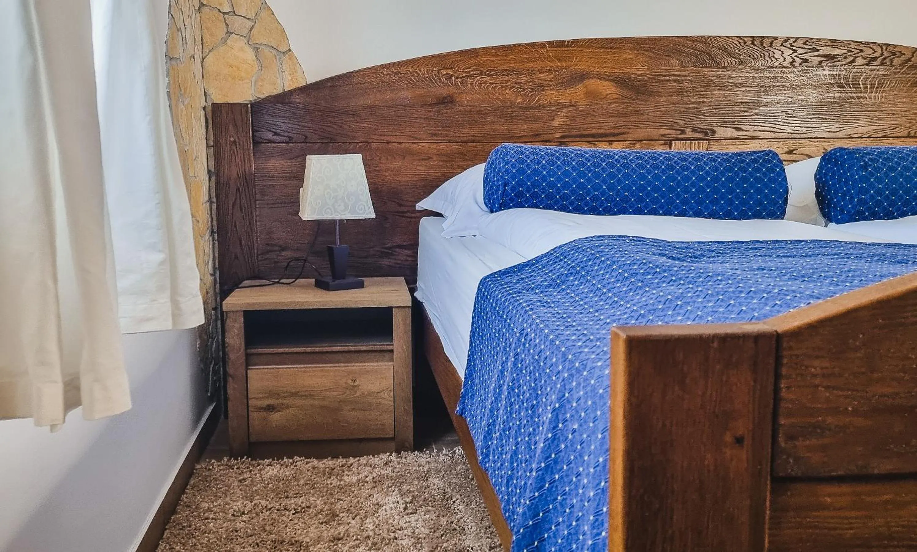 Bed in Etno Garden Apartments