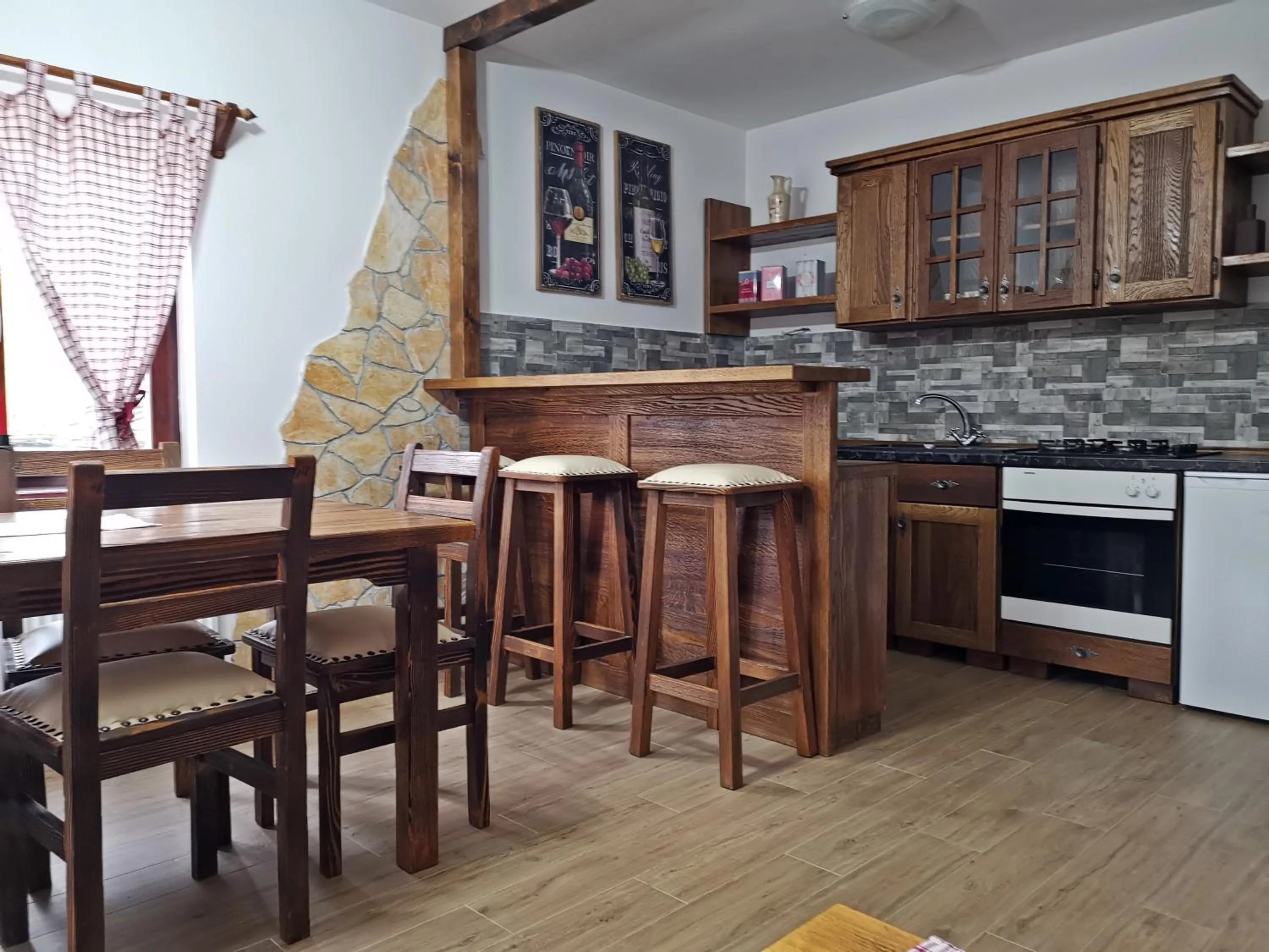Kitchen or kitchenette in Etno Garden Apartments