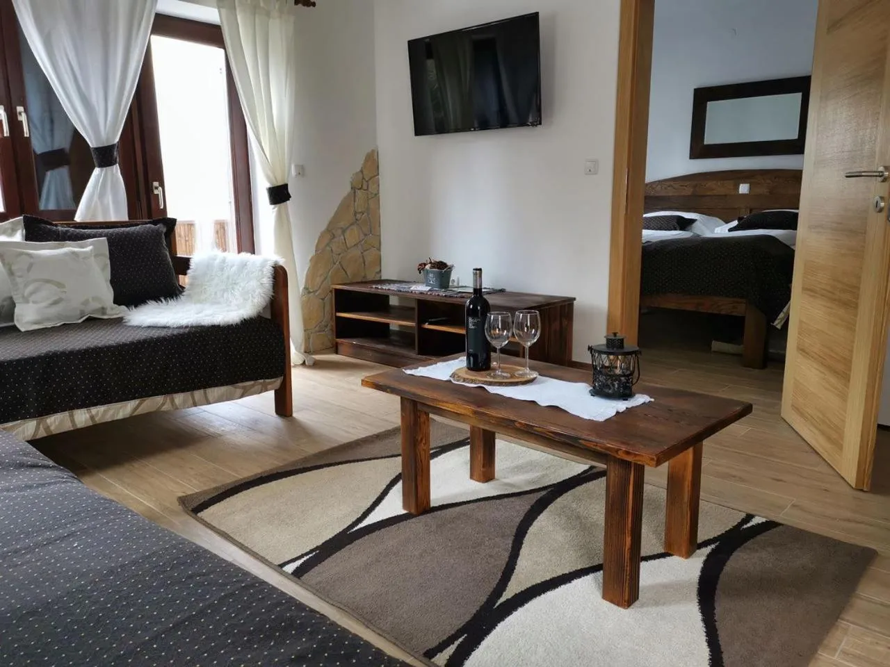 Bed in Etno Garden Apartments