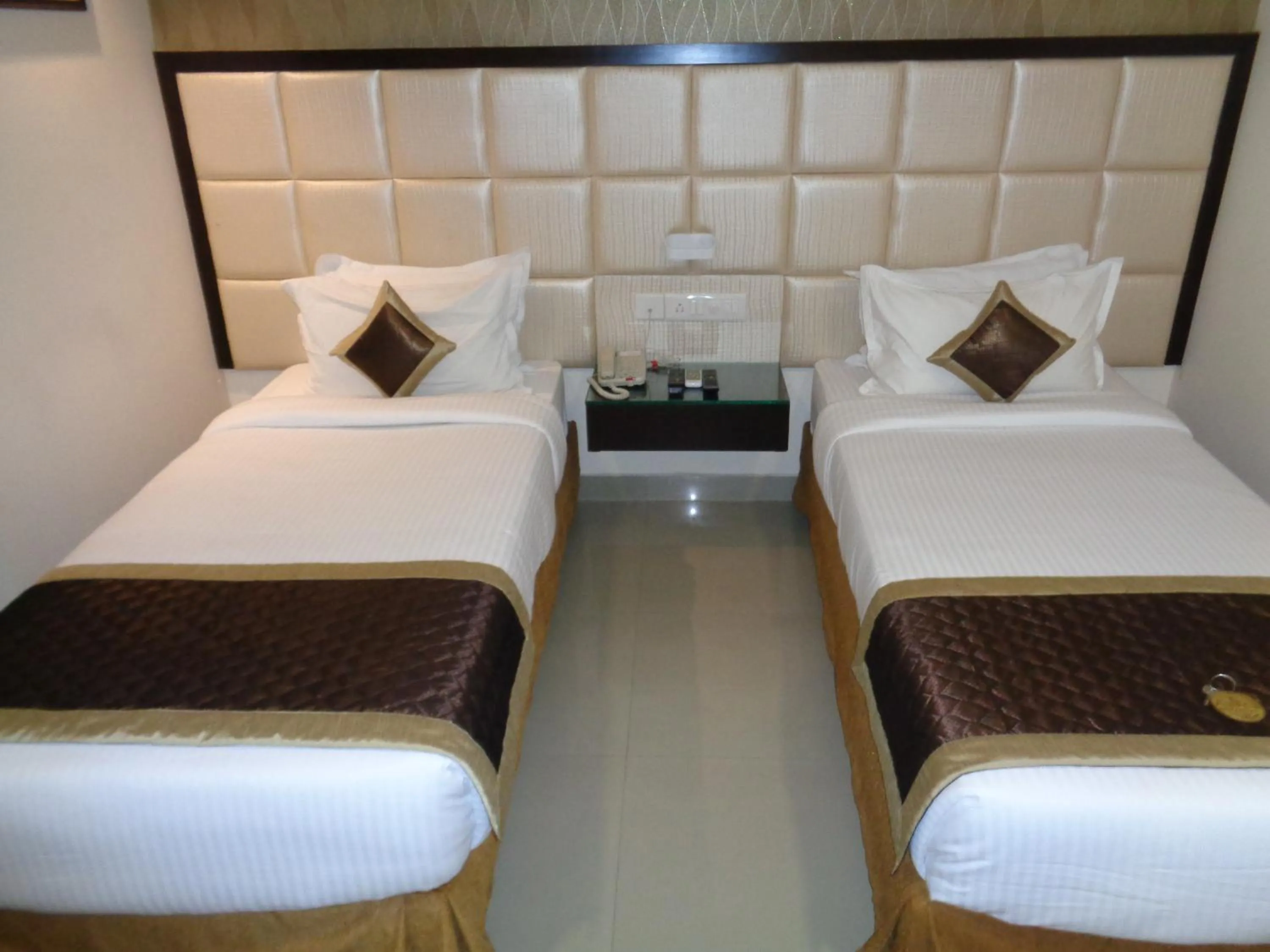 Photo of the whole room, Bed in The AVR Hotels & Banquets