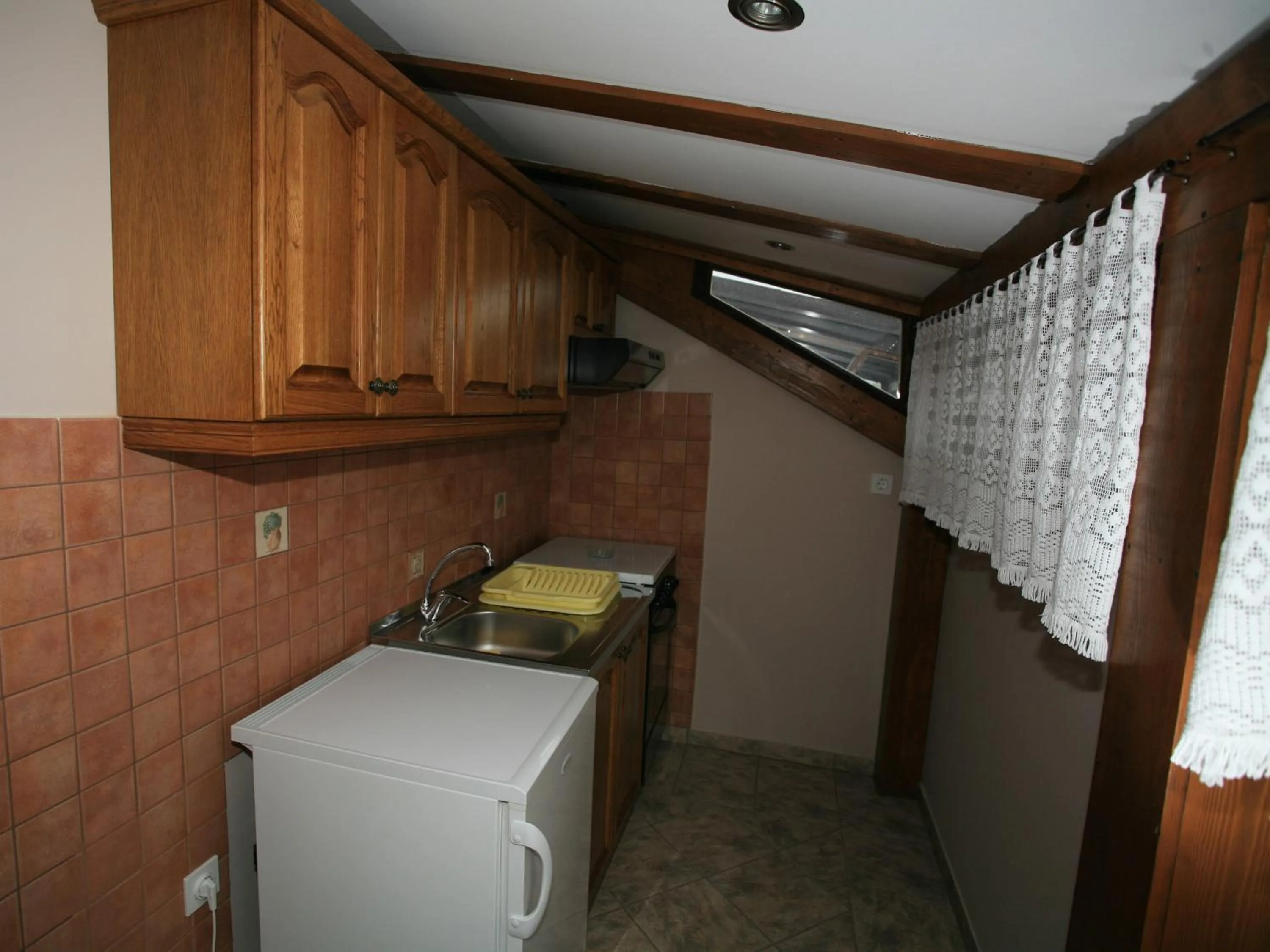 Kitchen or kitchenette in Apartments Vrata Baranje