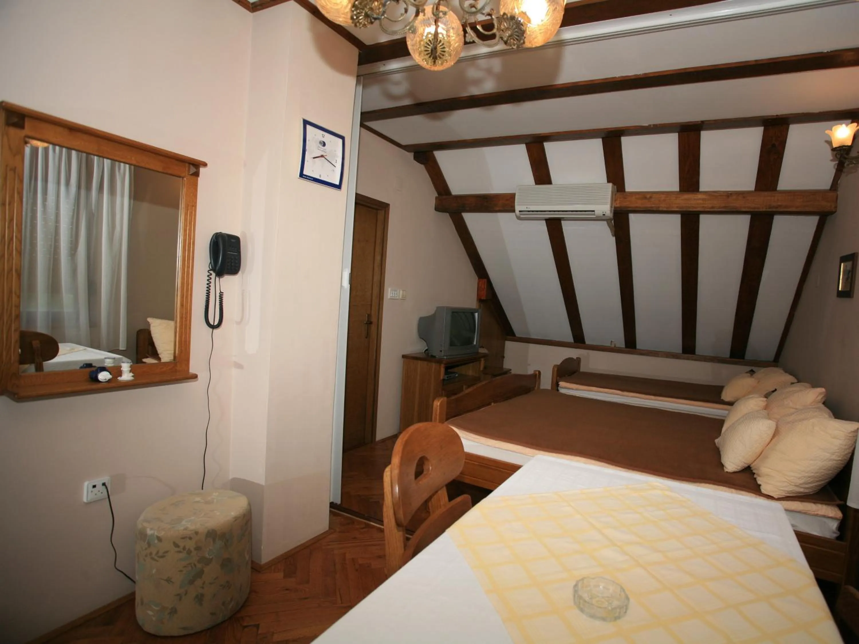 Dining area, Bed in Apartments Vrata Baranje