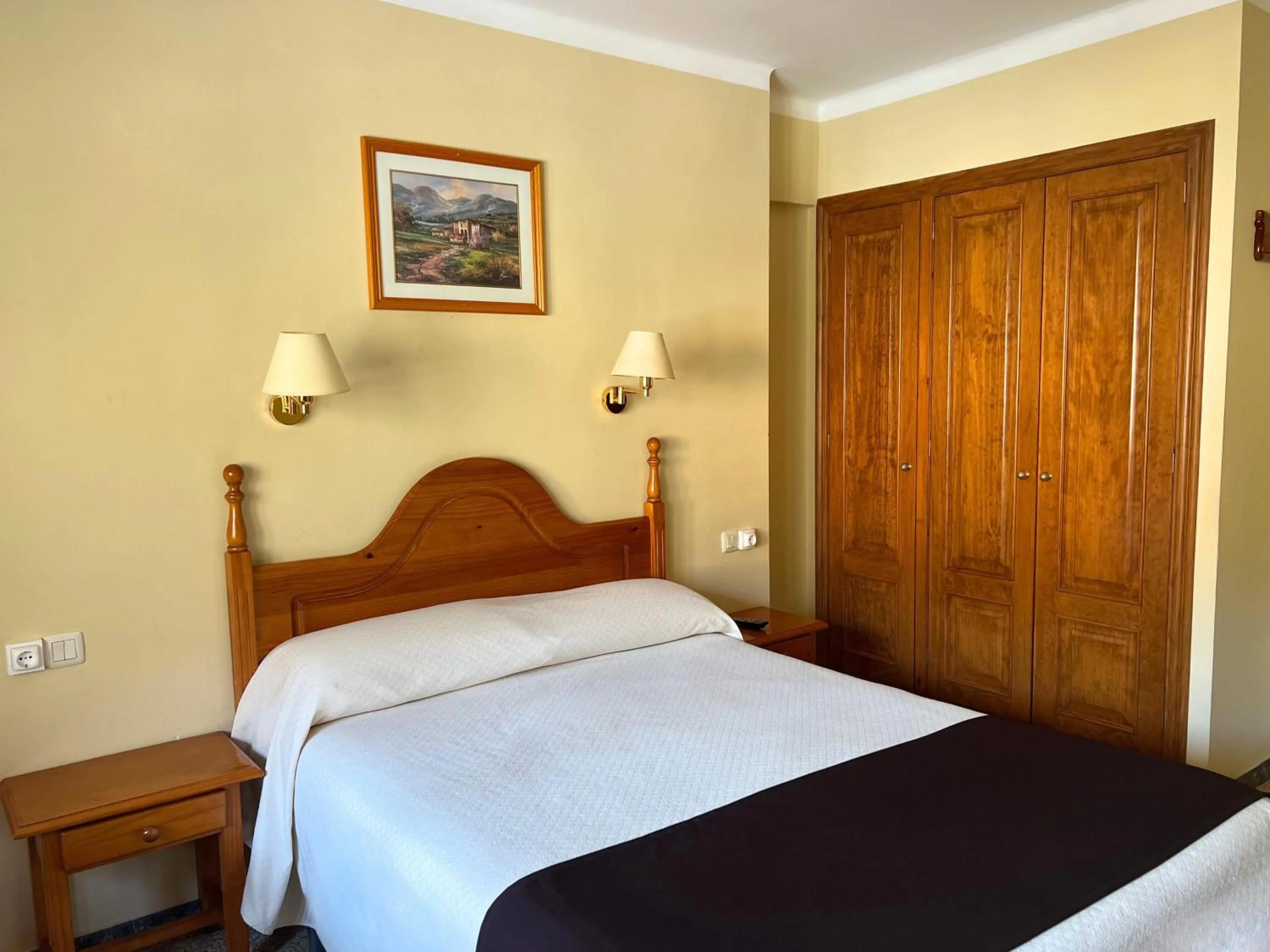 Bed in Hotel Juan Canejan