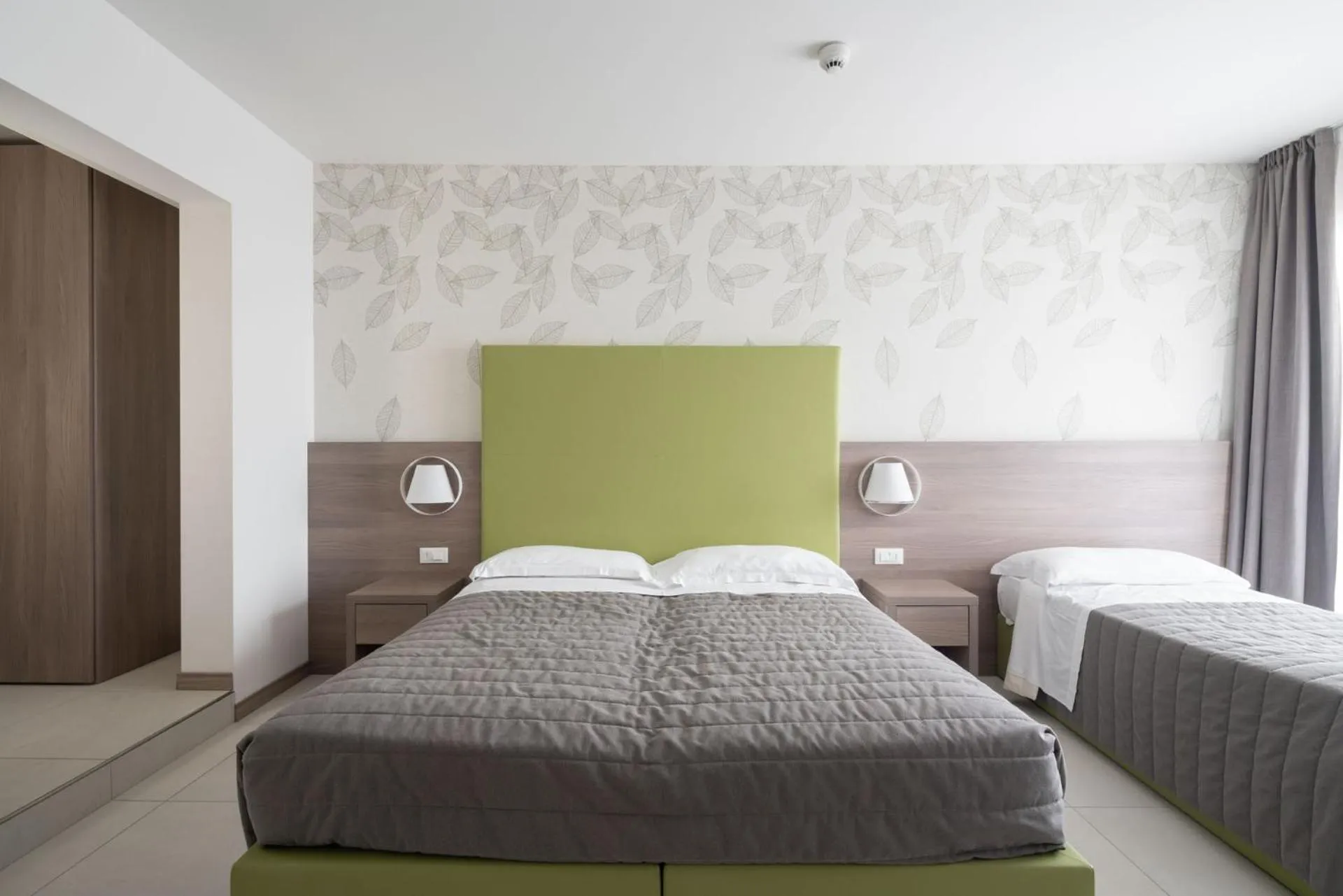 Bed in Hotel Iris Jesolo