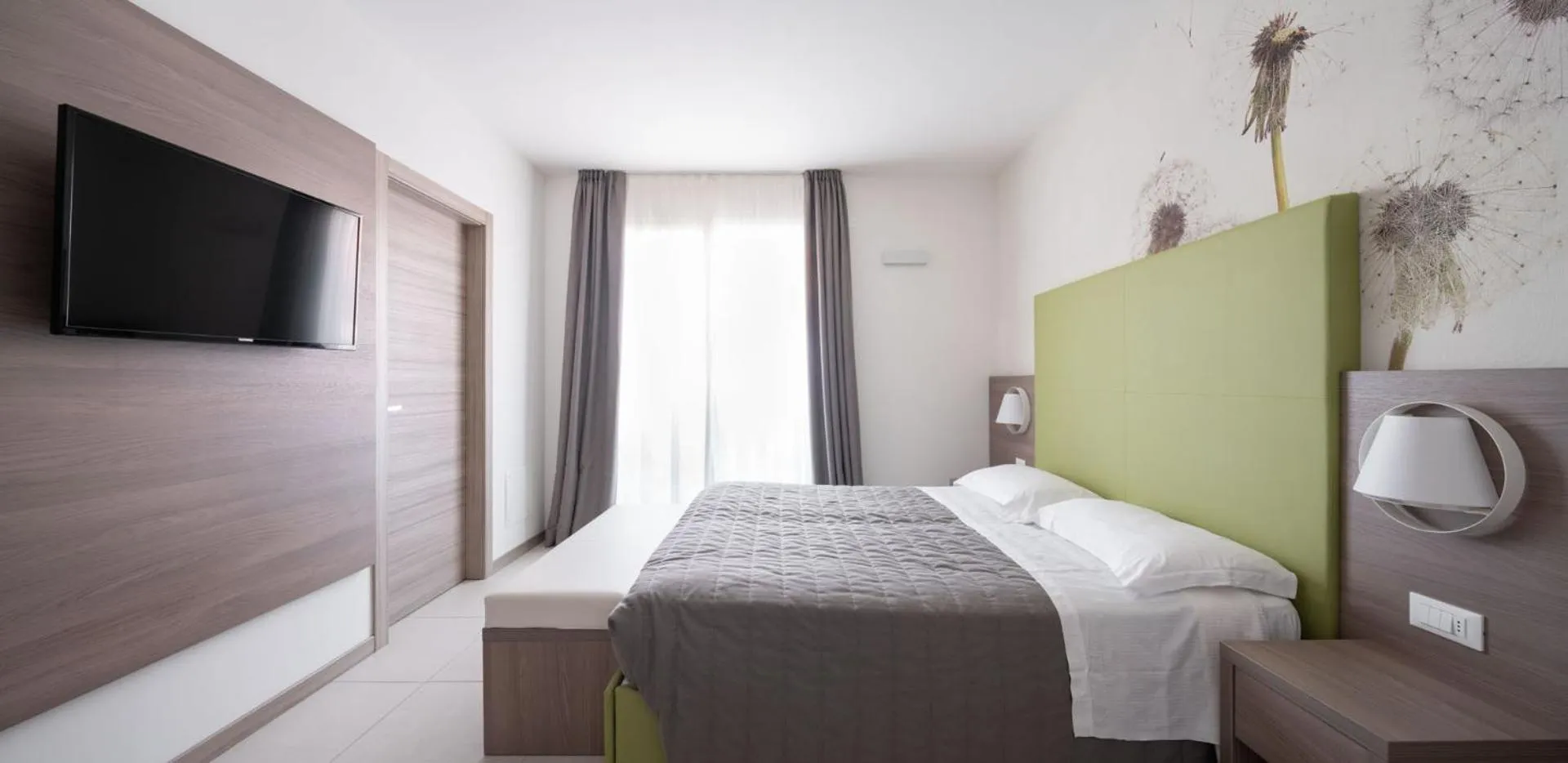 Bed in Hotel Iris Jesolo