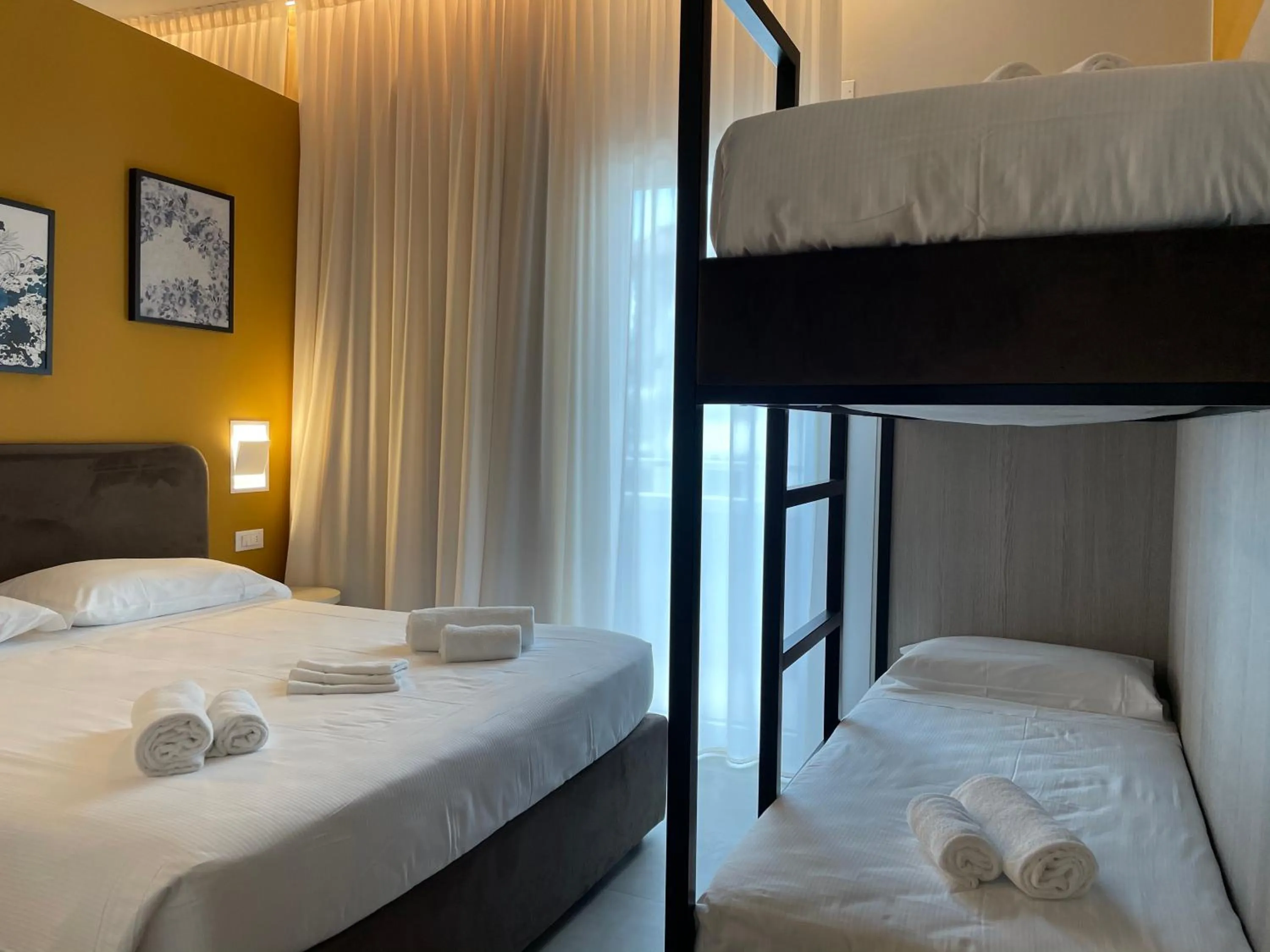 Bed in Hotel Iris Jesolo