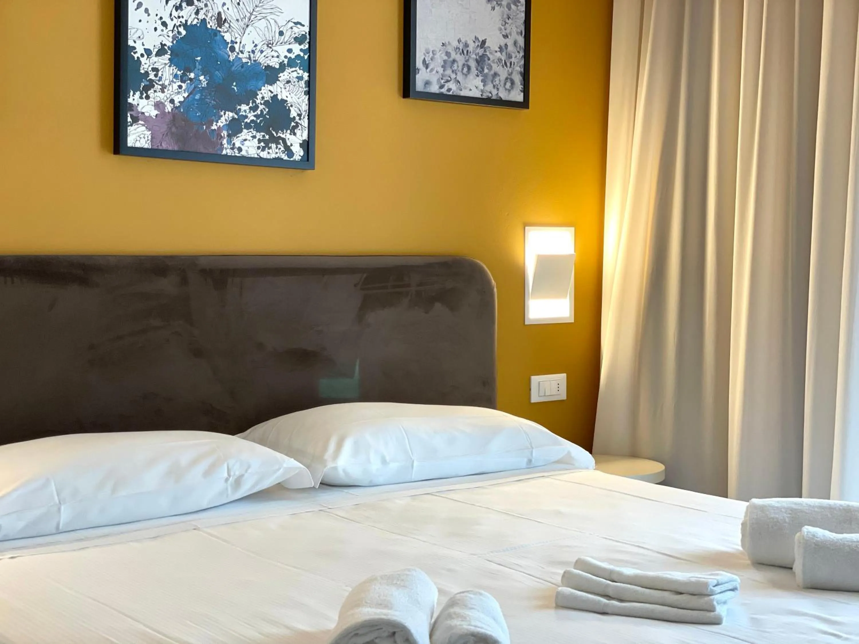 Bed in Hotel Iris Jesolo