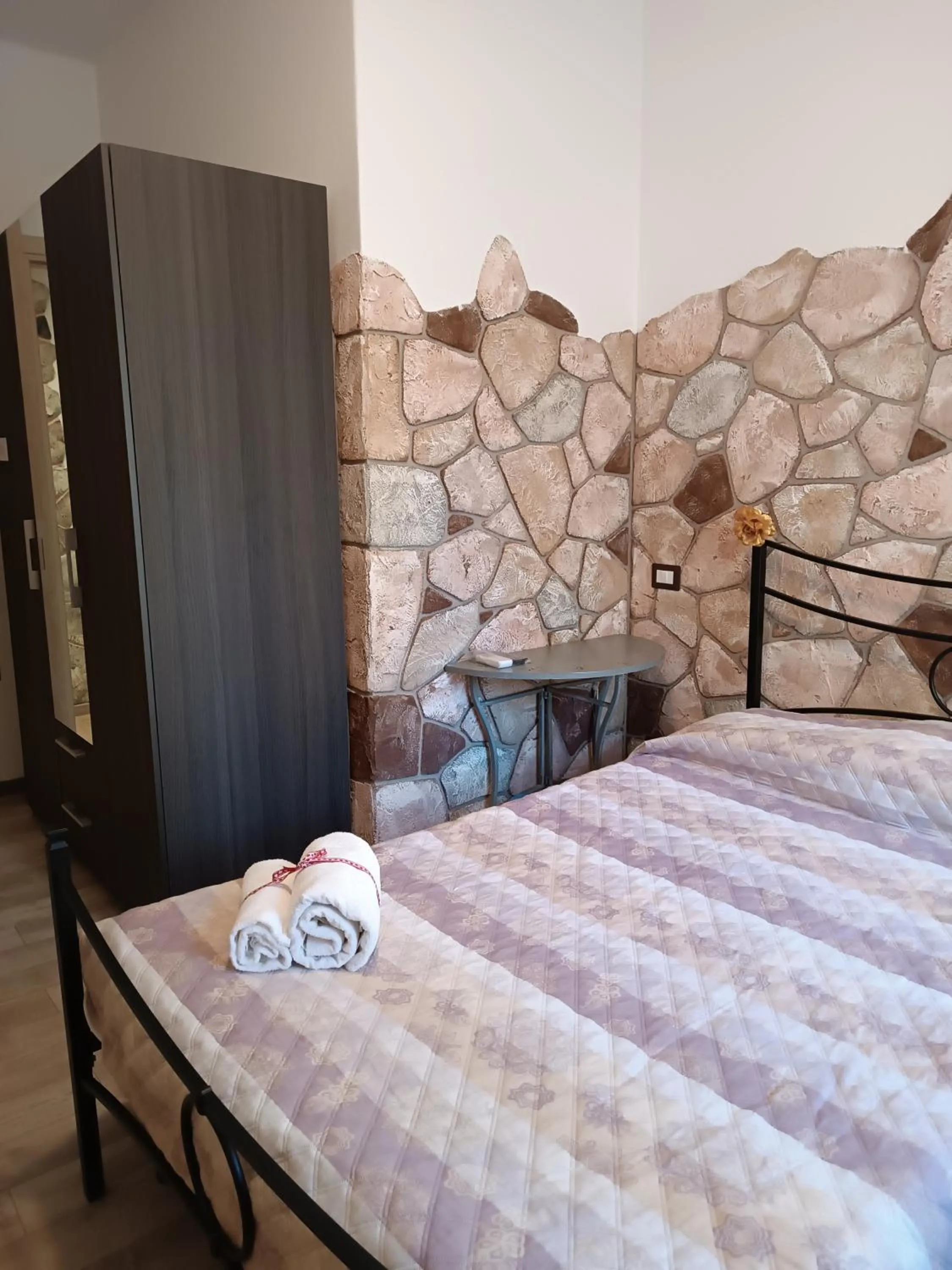 Bed in Rocca Pinta Guest House
