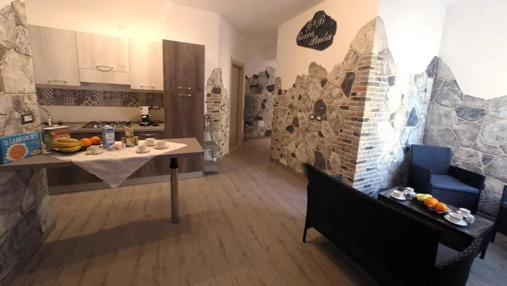 Communal lounge/ TV room in Rocca Pinta Guest House