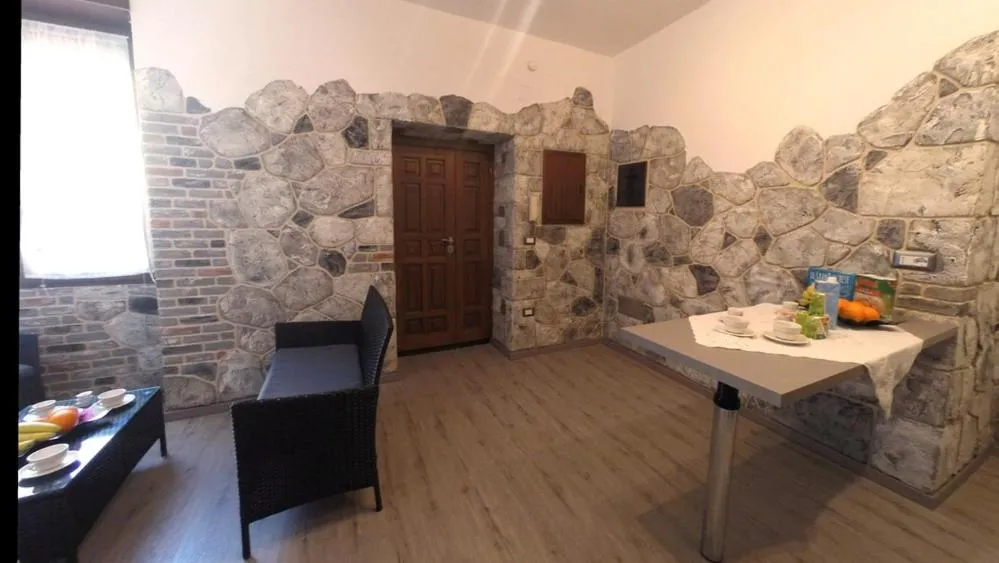 Communal lounge/ TV room in Rocca Pinta Guest House