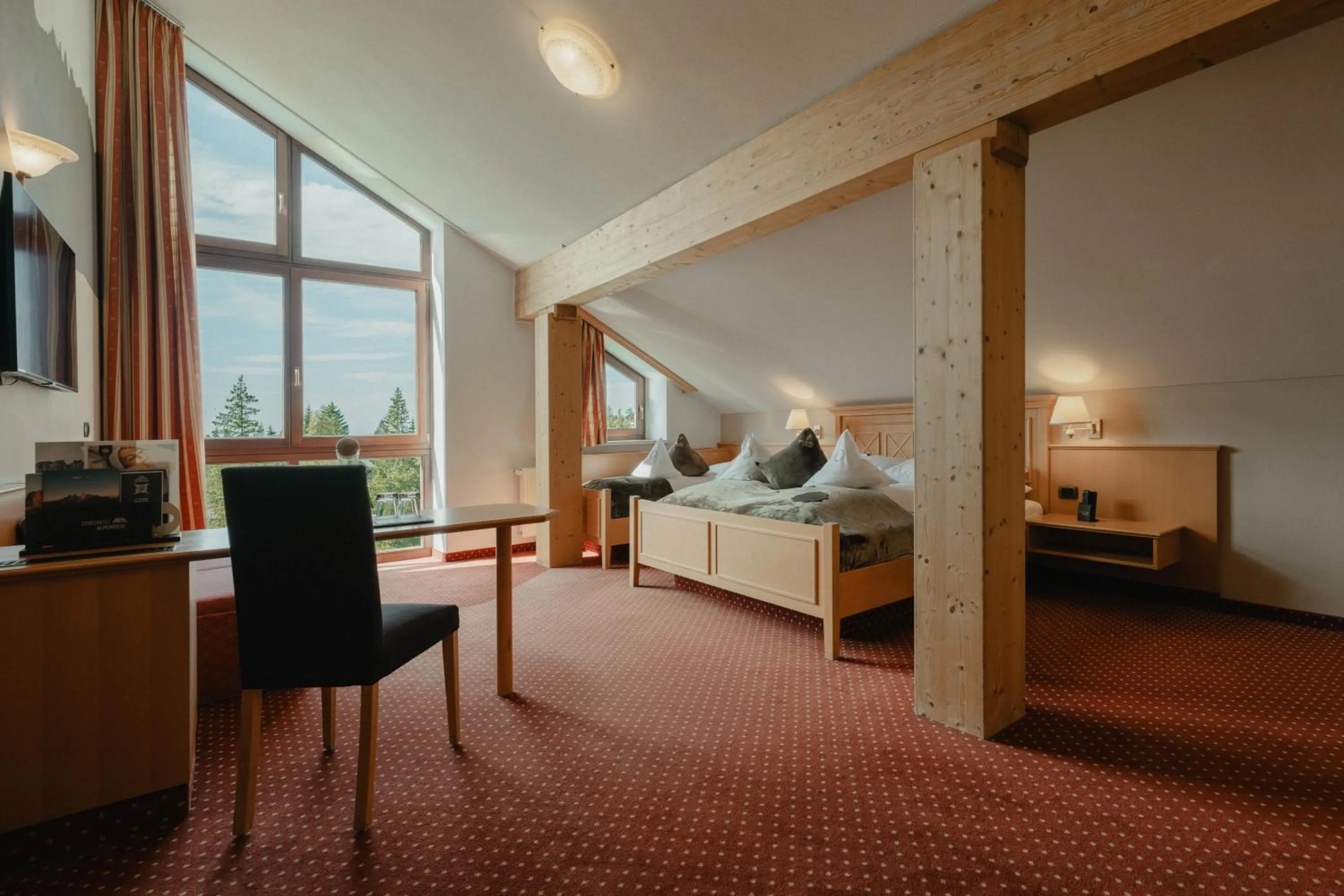 Bed in Hotel Alpenrose
