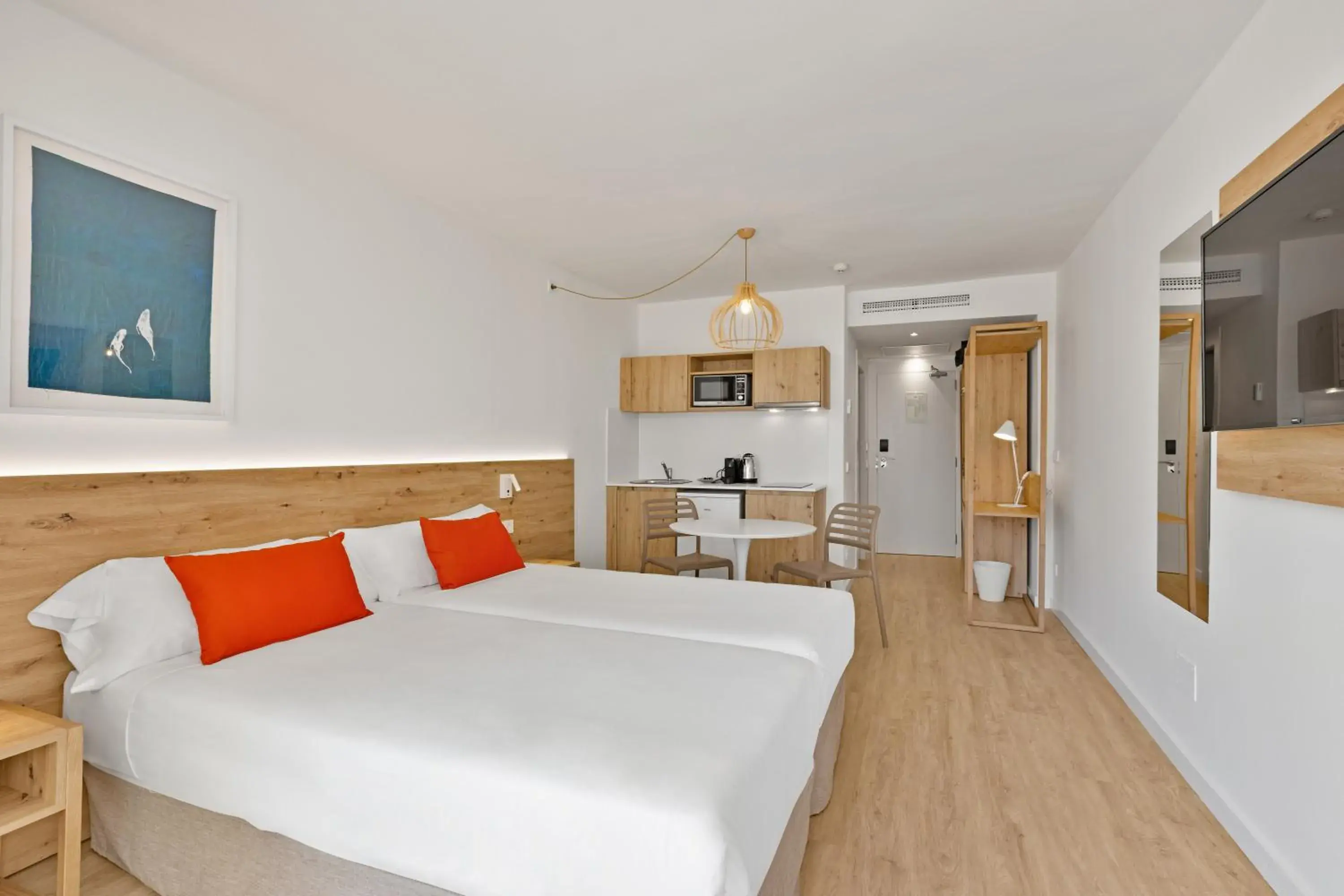 Bed in Palmanova Beach Apartments by TRH Bed in Palmanova Beach Apartments by TRH