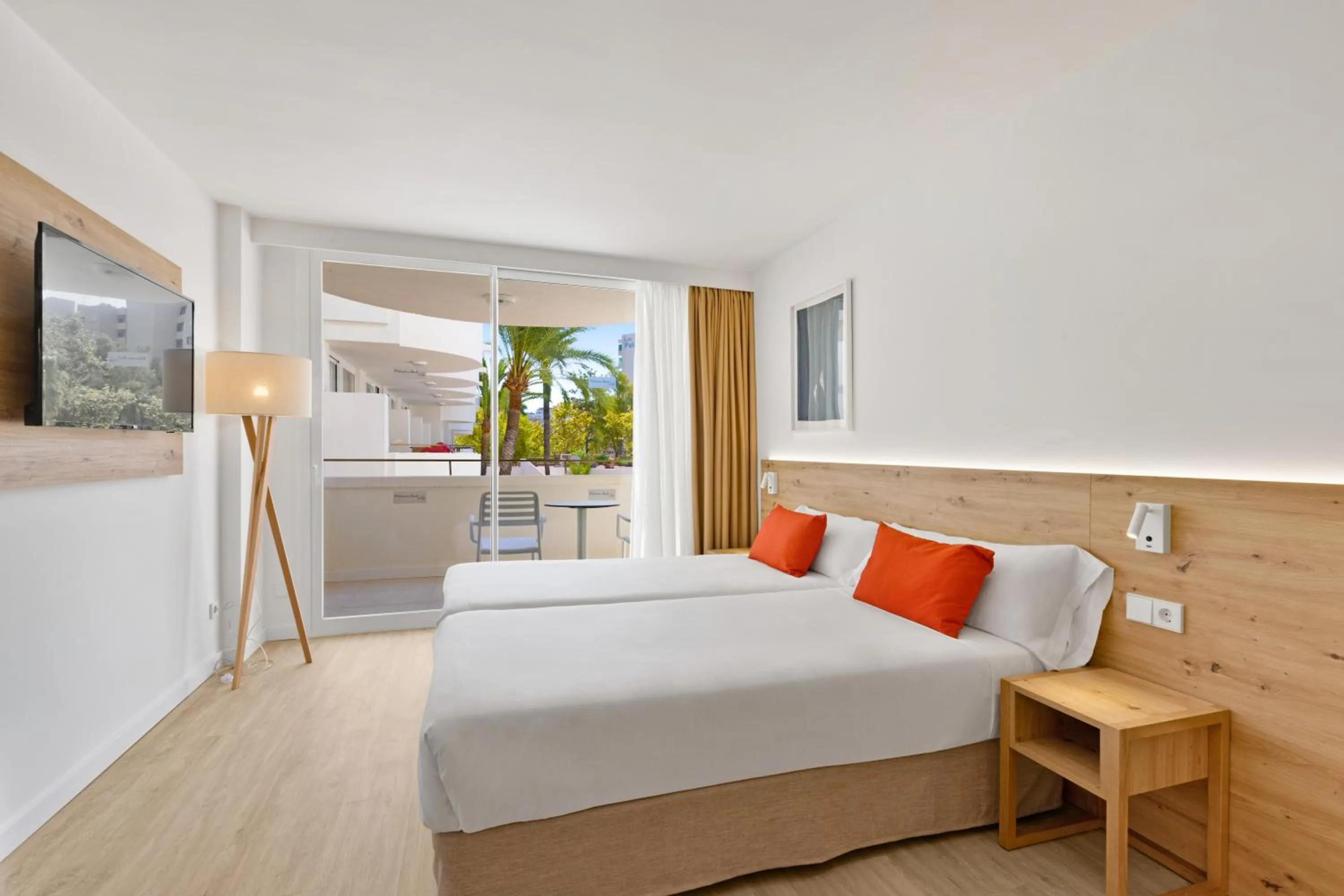 Bed in Palmanova Beach Apartments by TRH