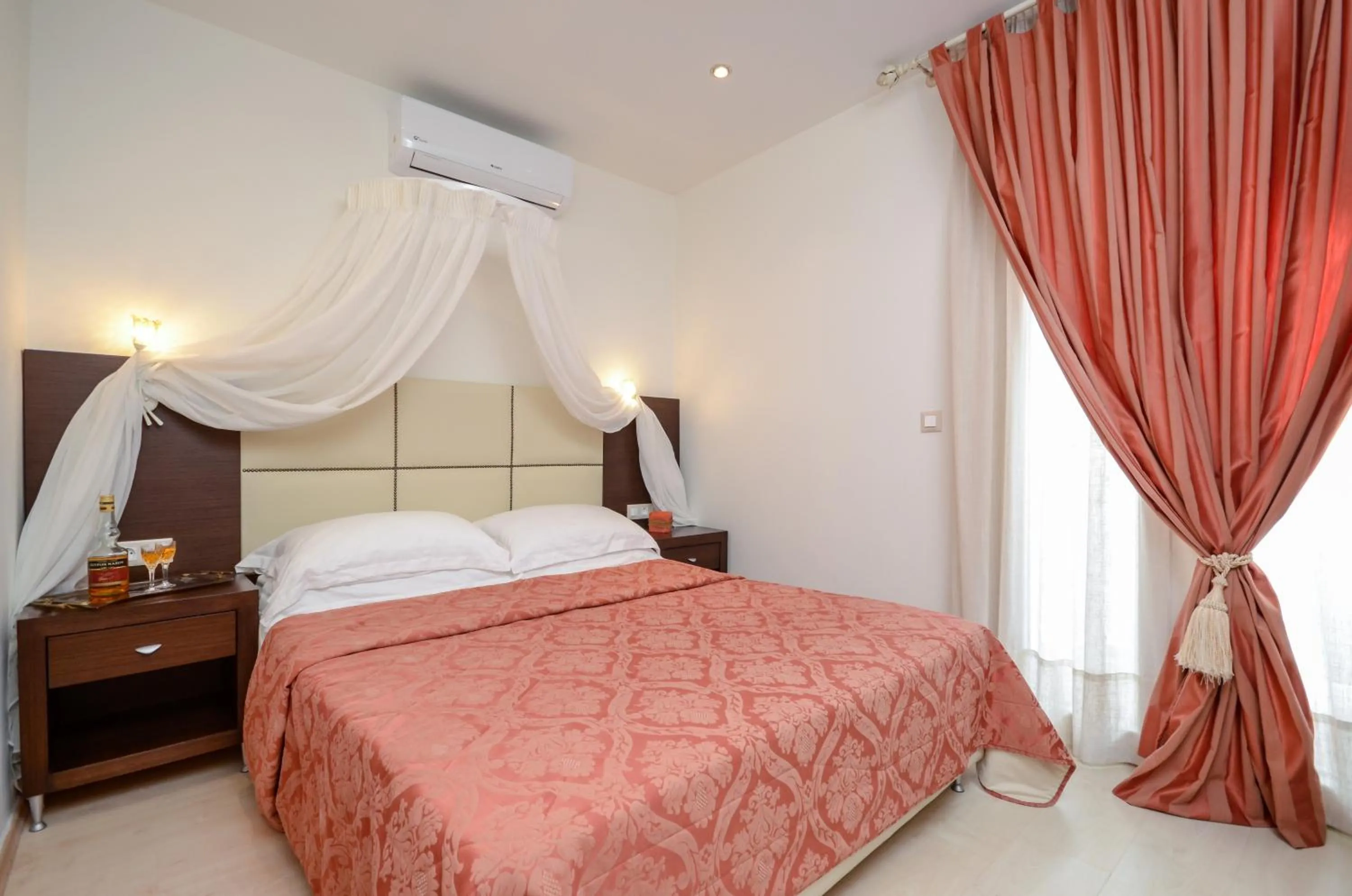 Bed in Aeolis Boutique Hotel