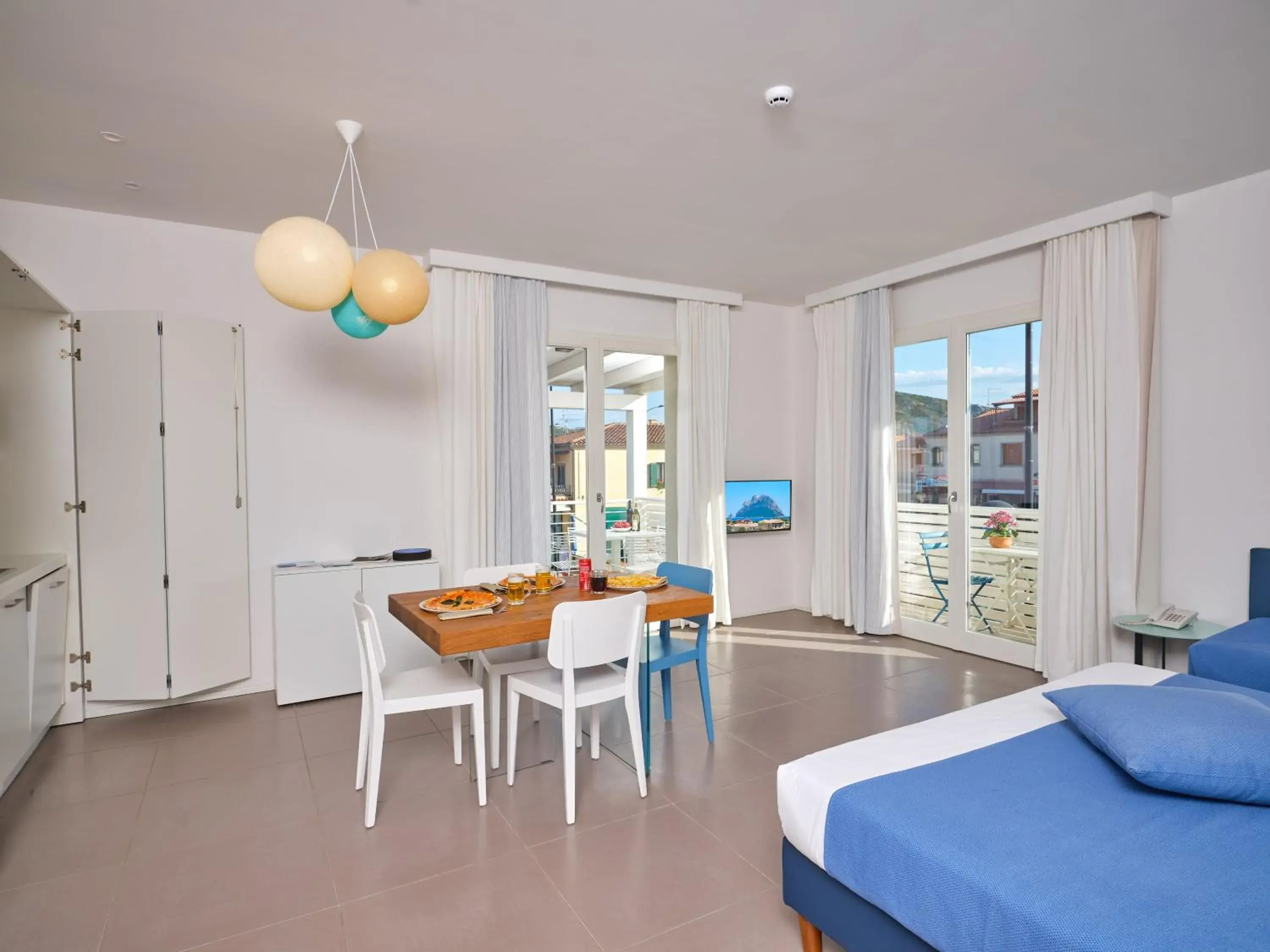 Balcony/Terrace, Bed in Felix Hotels - Hotel Residence Porto San Paolo Balcony/Terrace, Bed in Felix Hotels - Hotel Residence Porto San Paolo