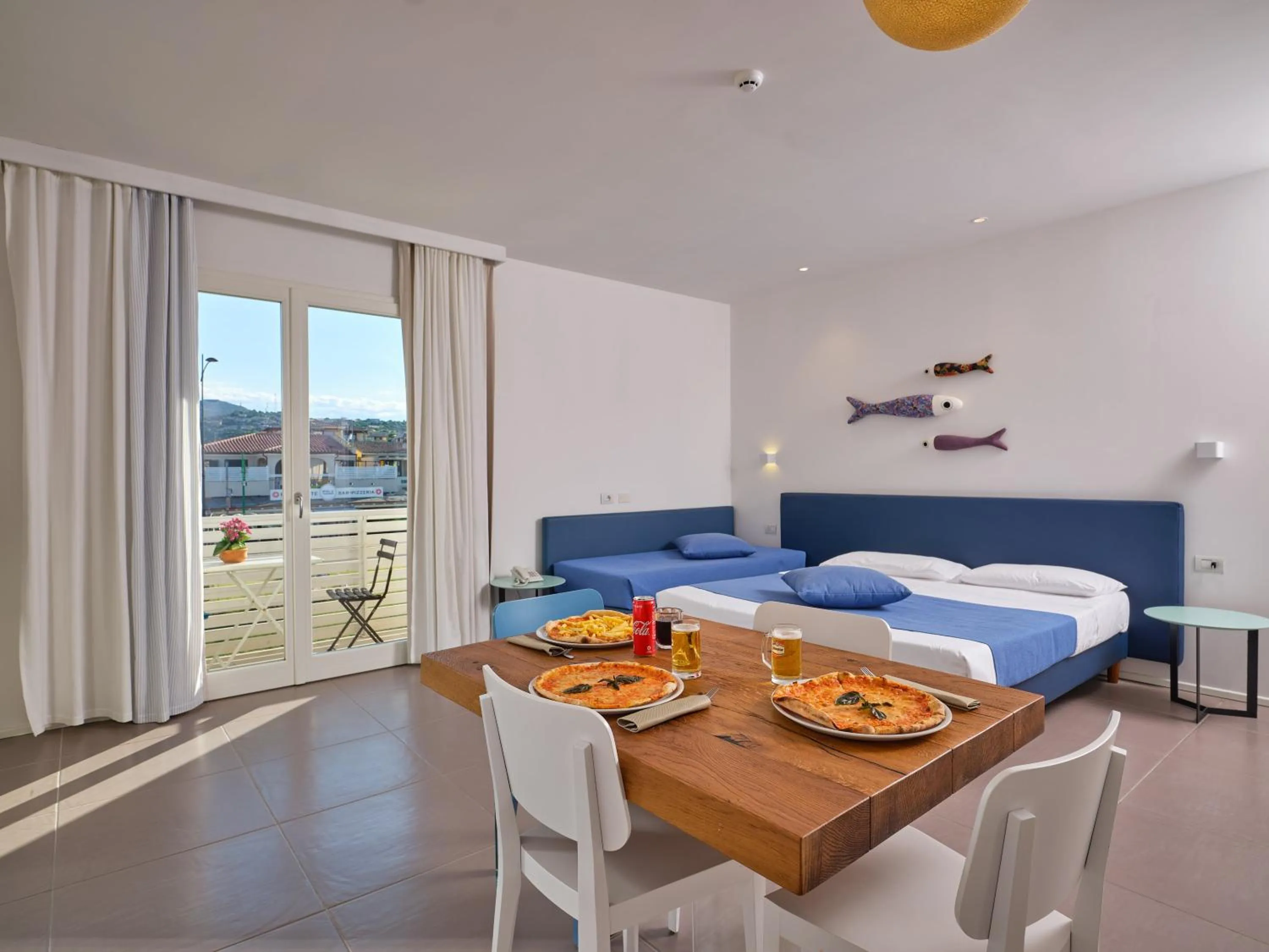 Balcony/Terrace, Bed in Felix Hotels - Hotel Residence Porto San Paolo