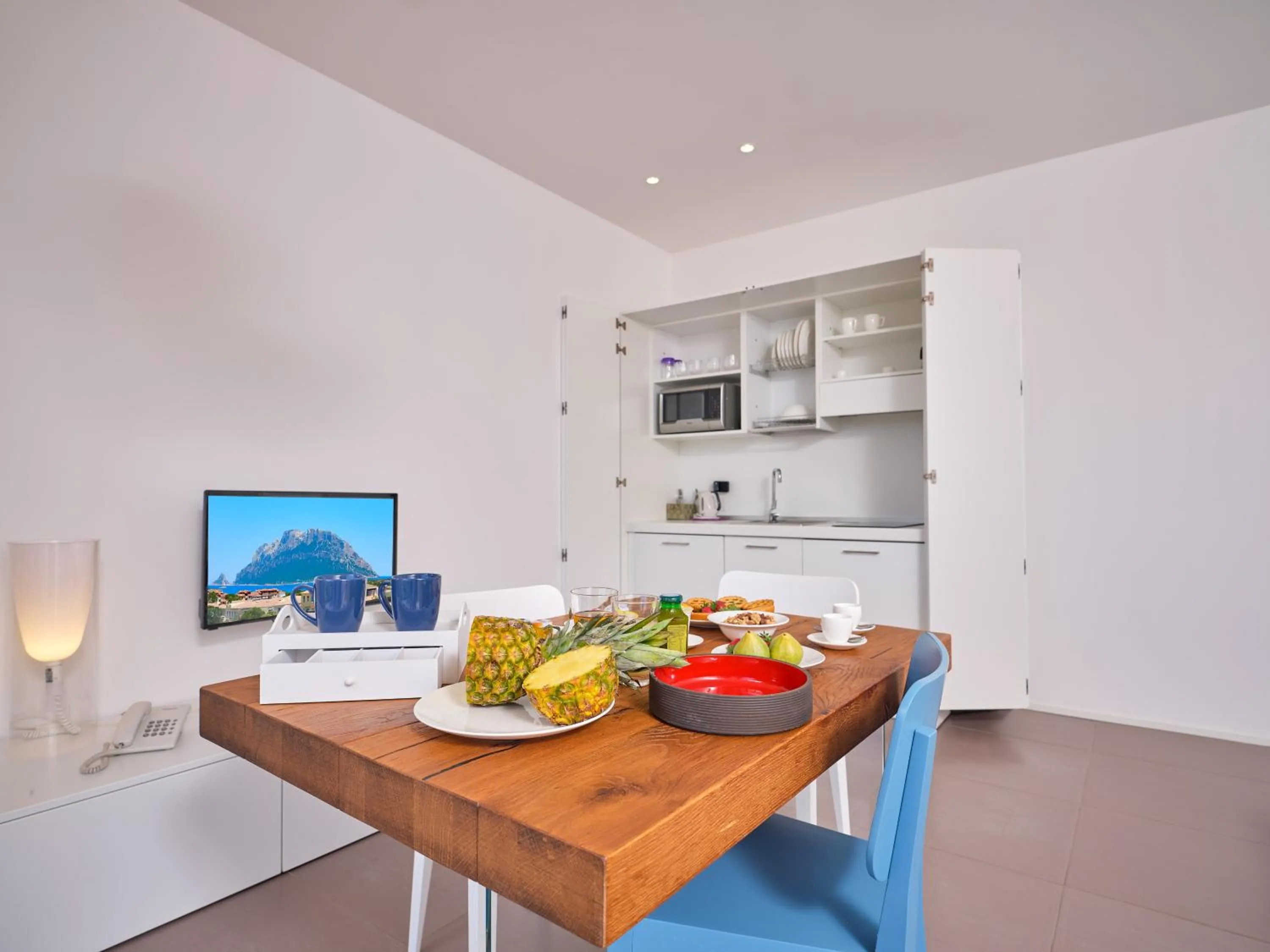 Kitchen or kitchenette in Felix Hotels - Hotel Residence Porto San Paolo